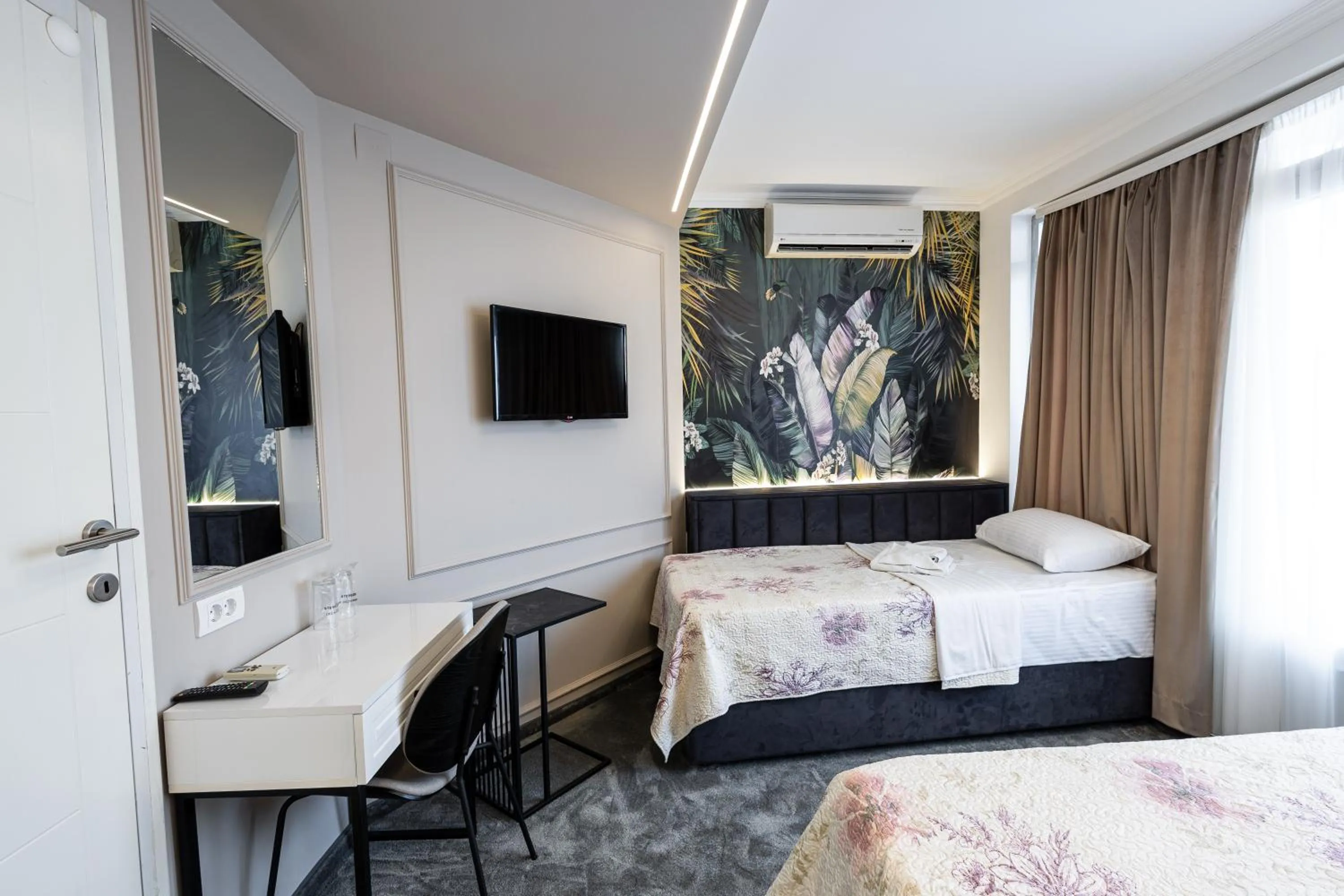 Bed in Garni Hotel Lotos