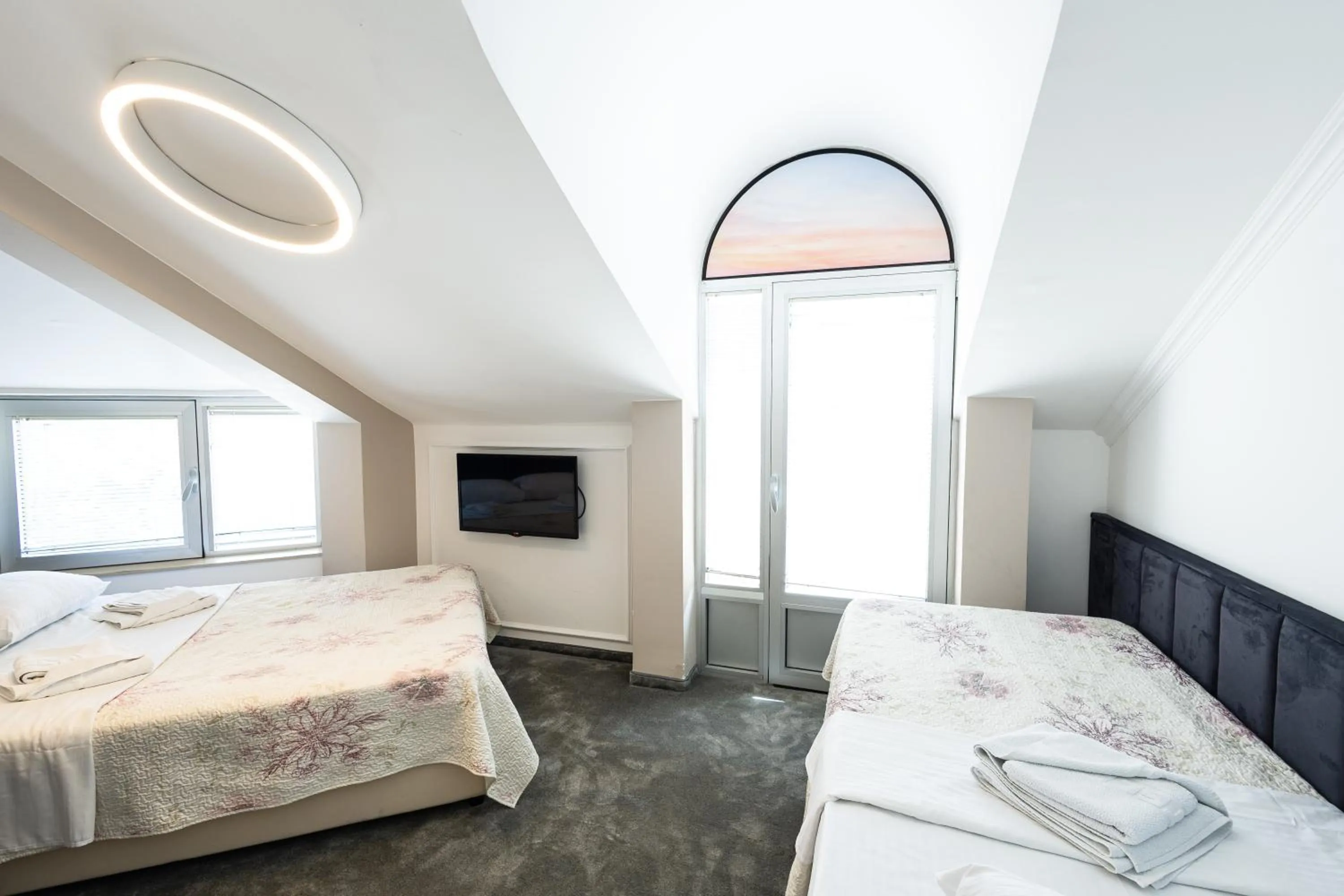 Bed in Garni Hotel Lotos