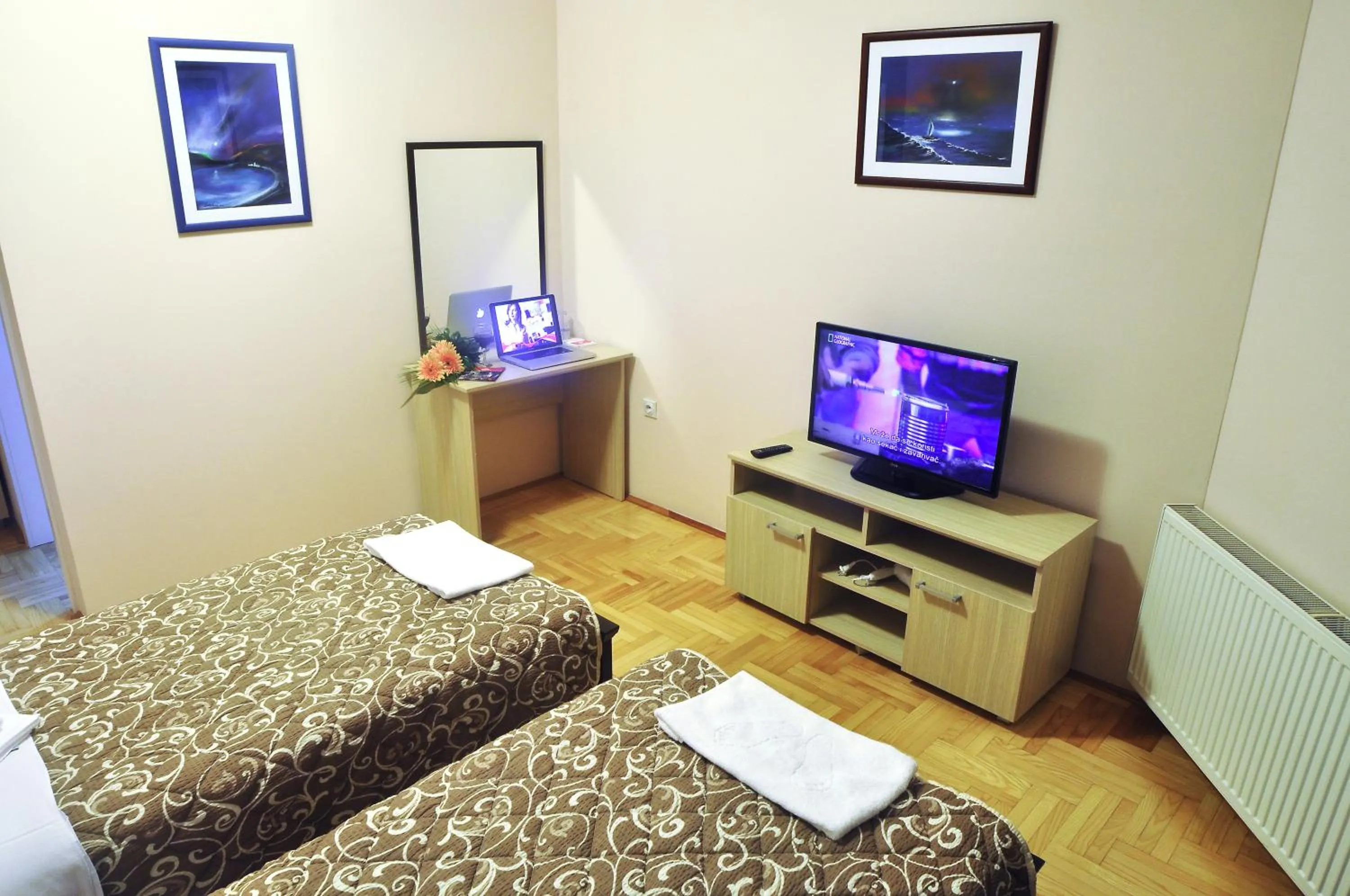 Bed in Garni Hotel Lotos