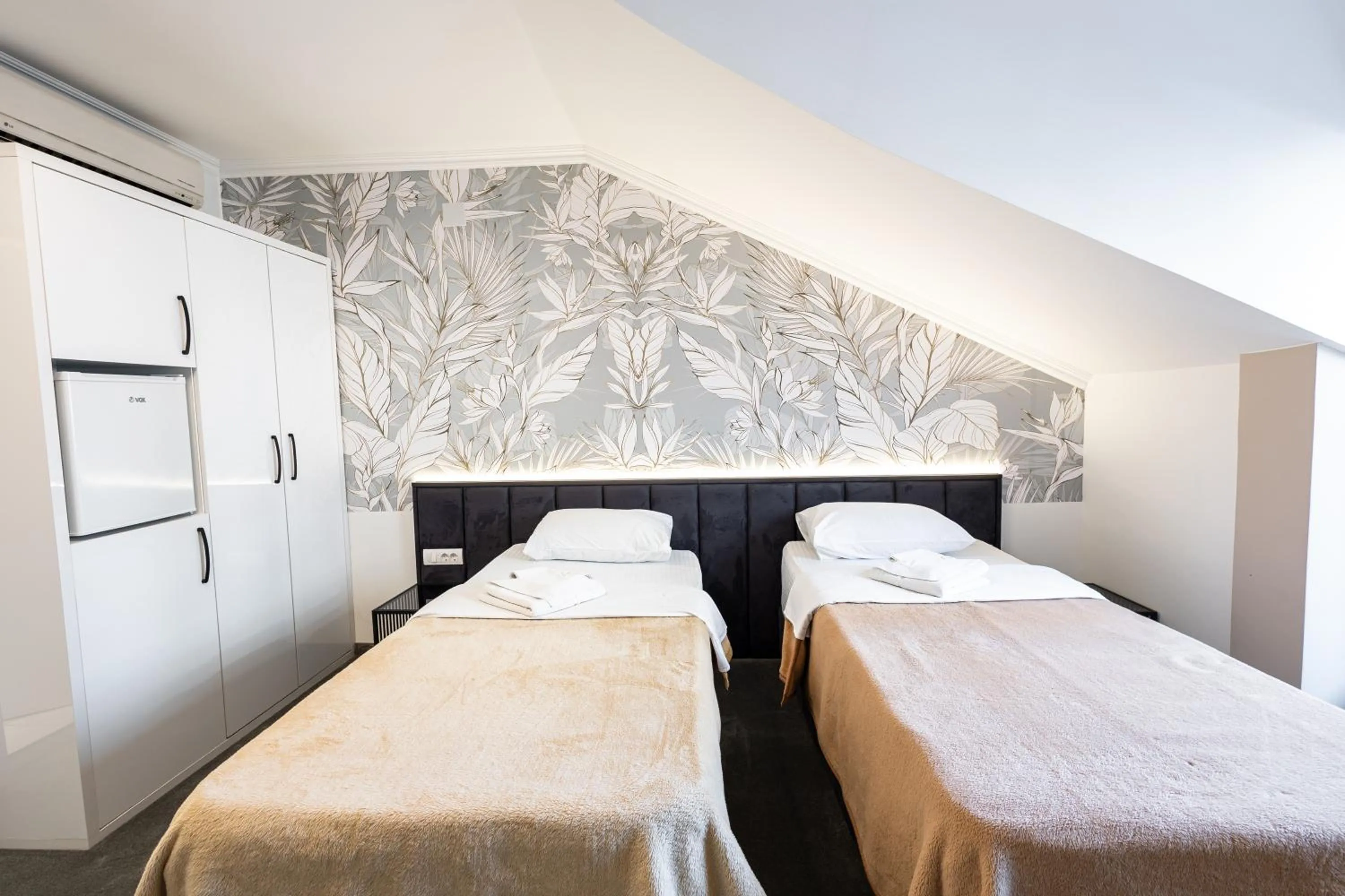 Photo of the whole room, Bed in Garni Hotel Lotos