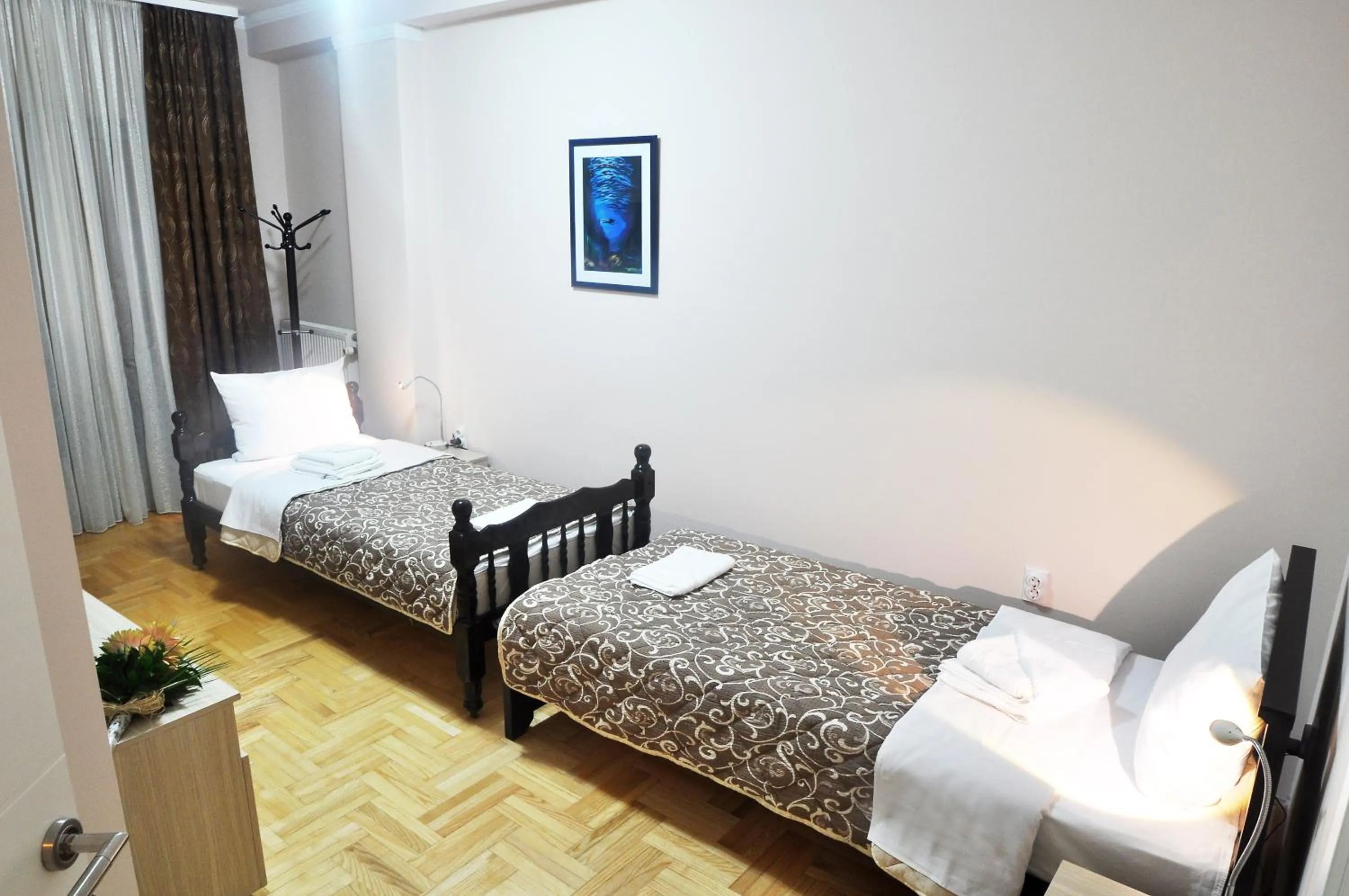 Bed in Garni Hotel Lotos