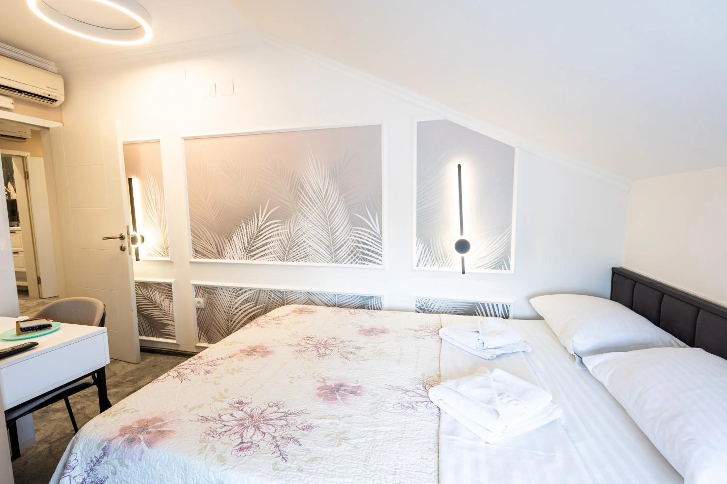 Bed in Garni Hotel Lotos