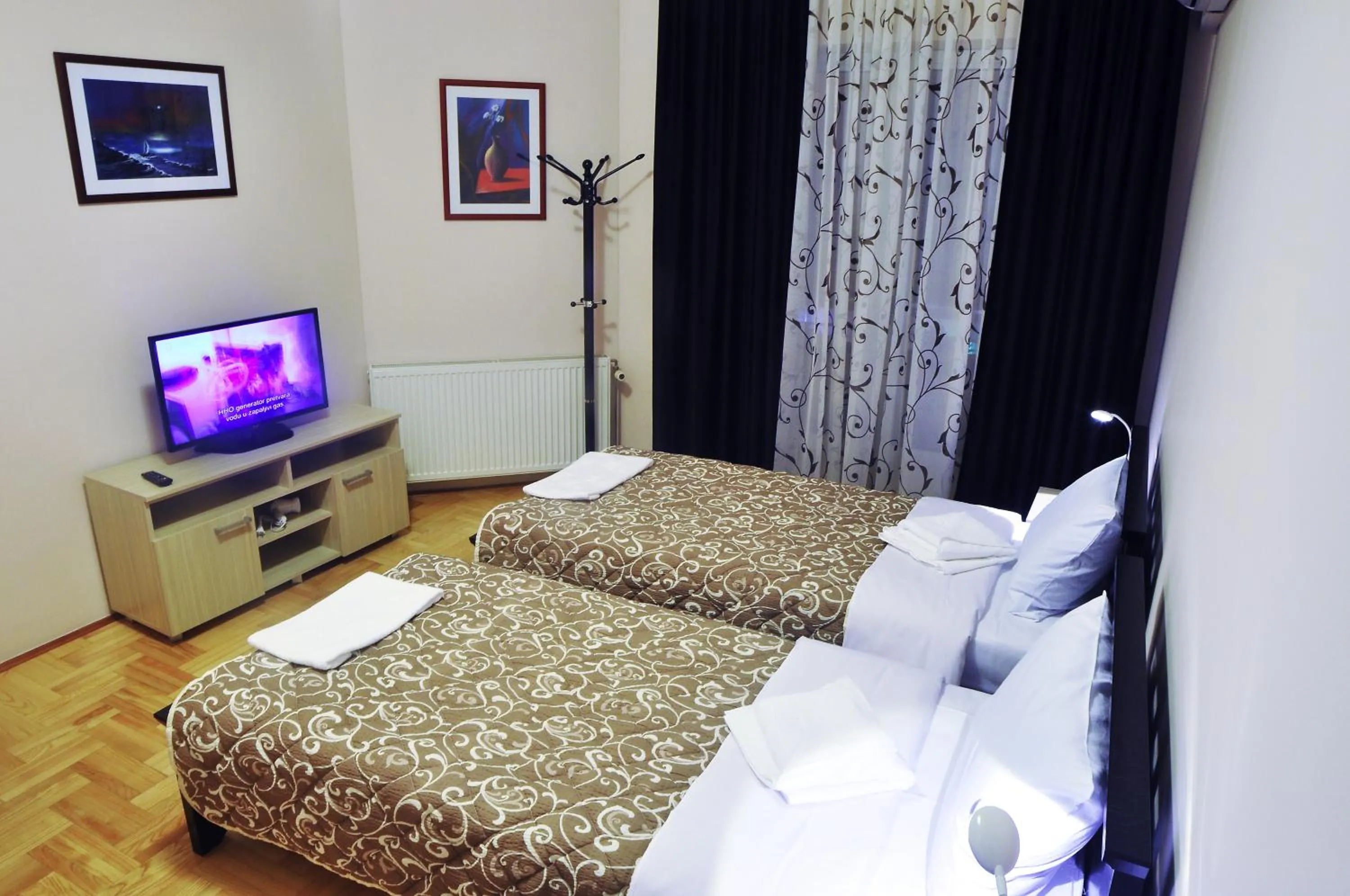 Bed in Garni Hotel Lotos