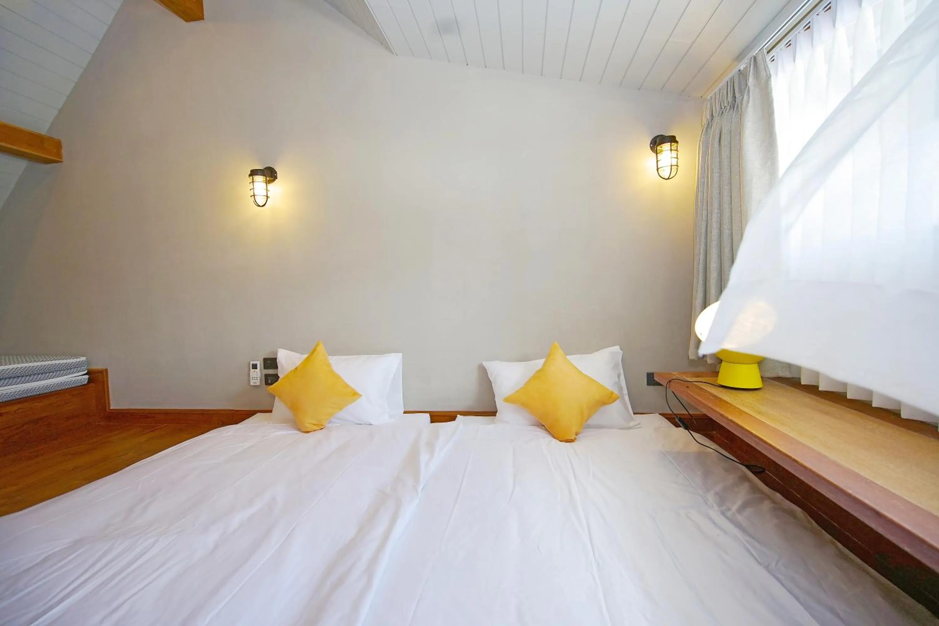 Bed in Yellow Pillow village