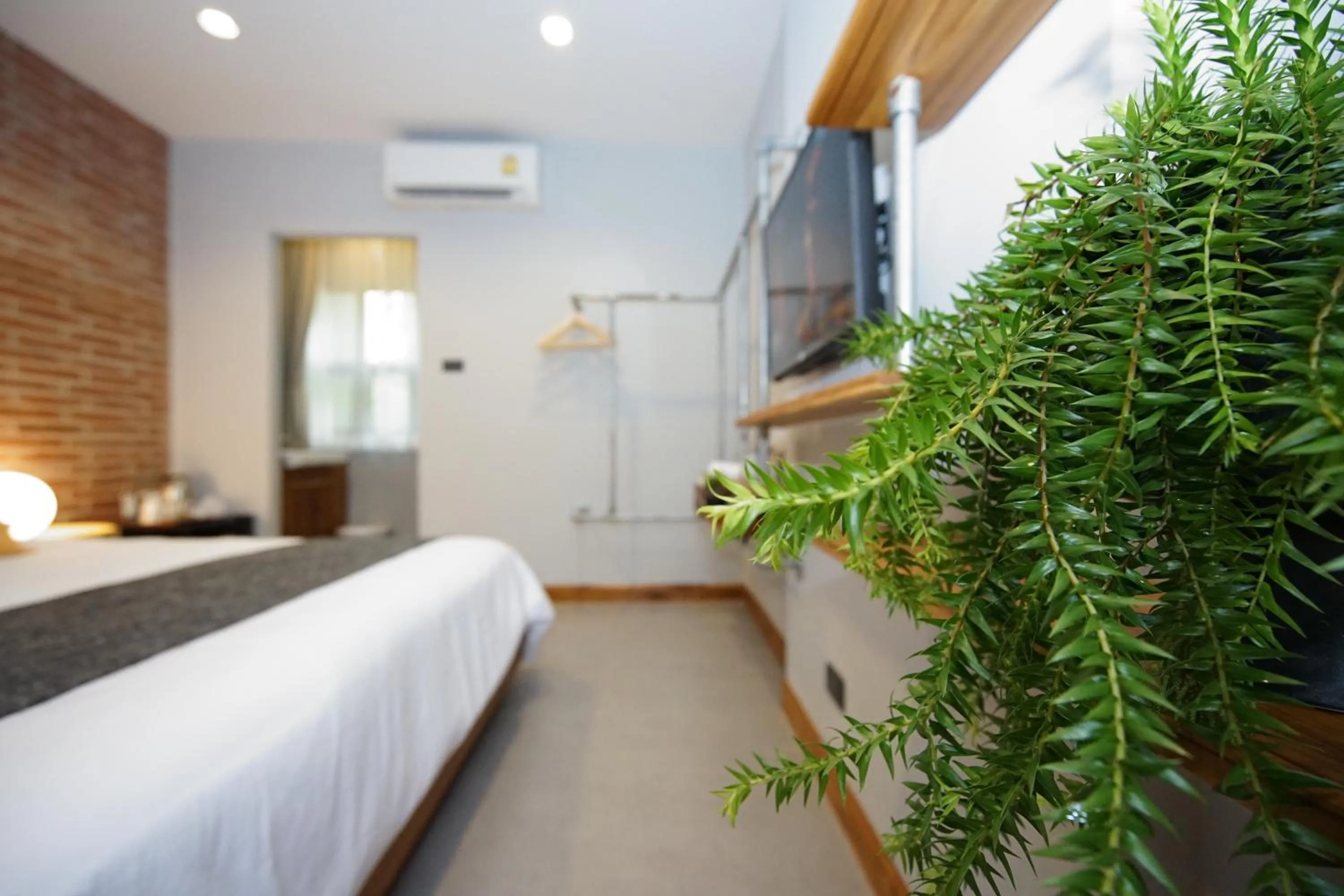 Photo of the whole room, Bed in Yellow Pillow village