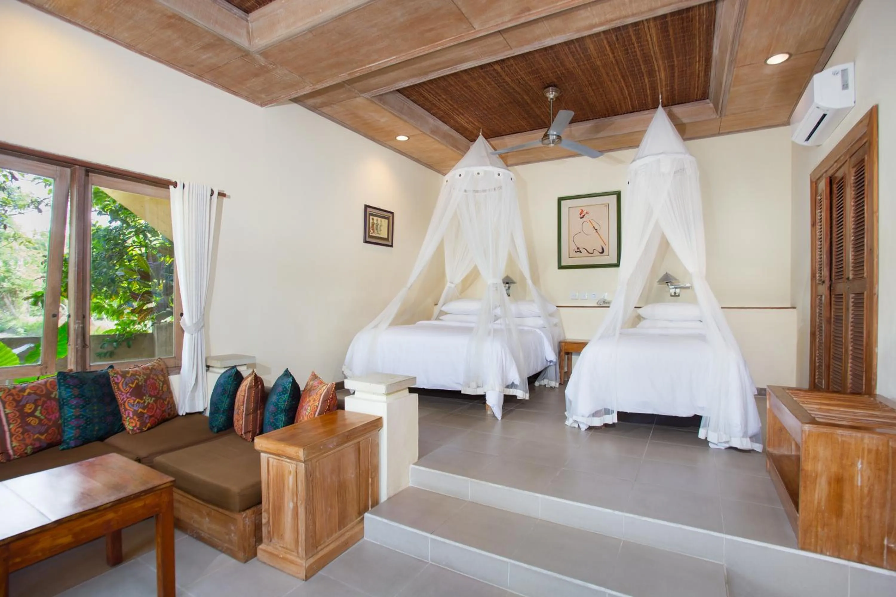 Bed in Tegal Sari Accommodation Ubud