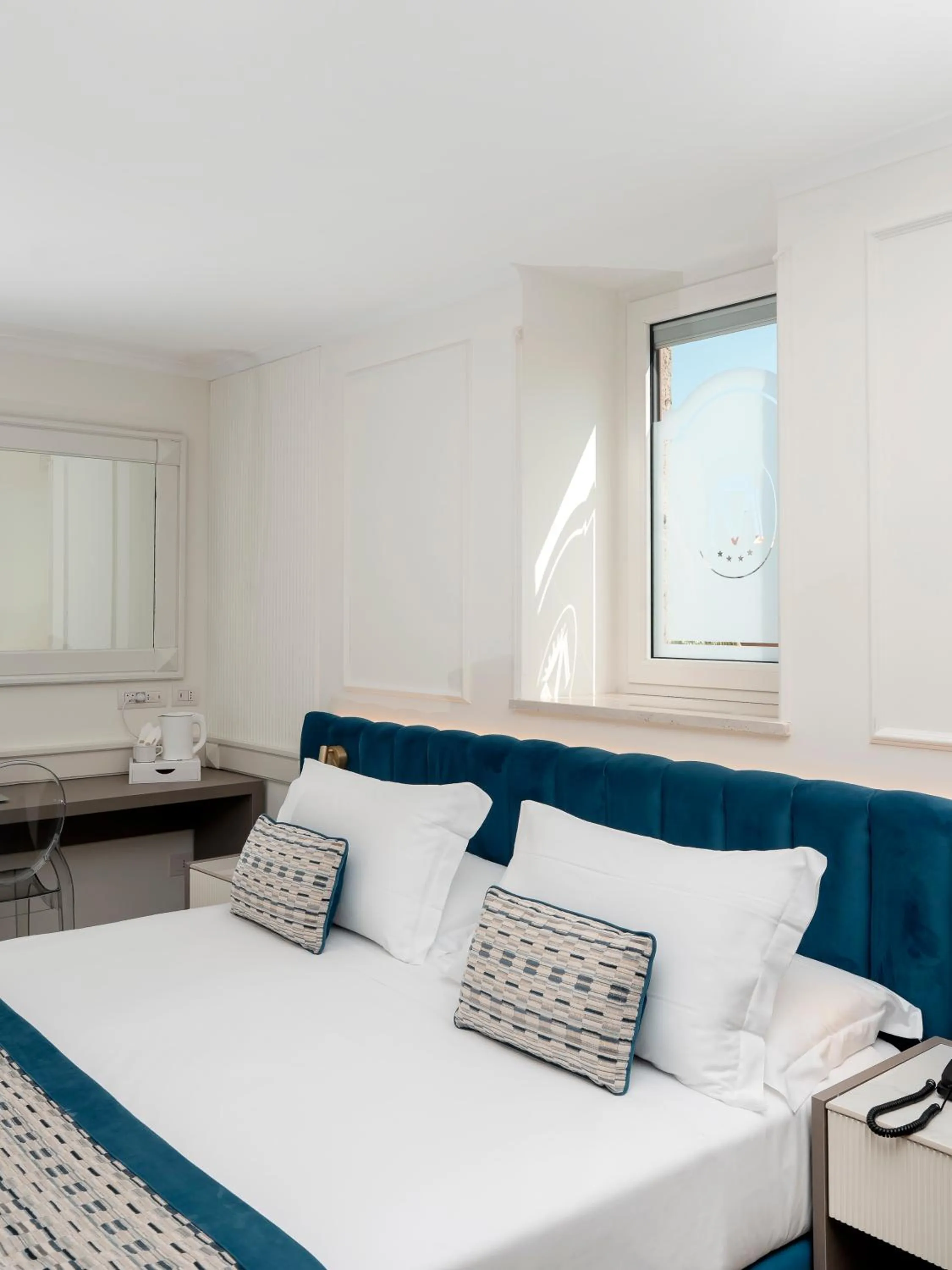 Bed in Hotel Michelangelo