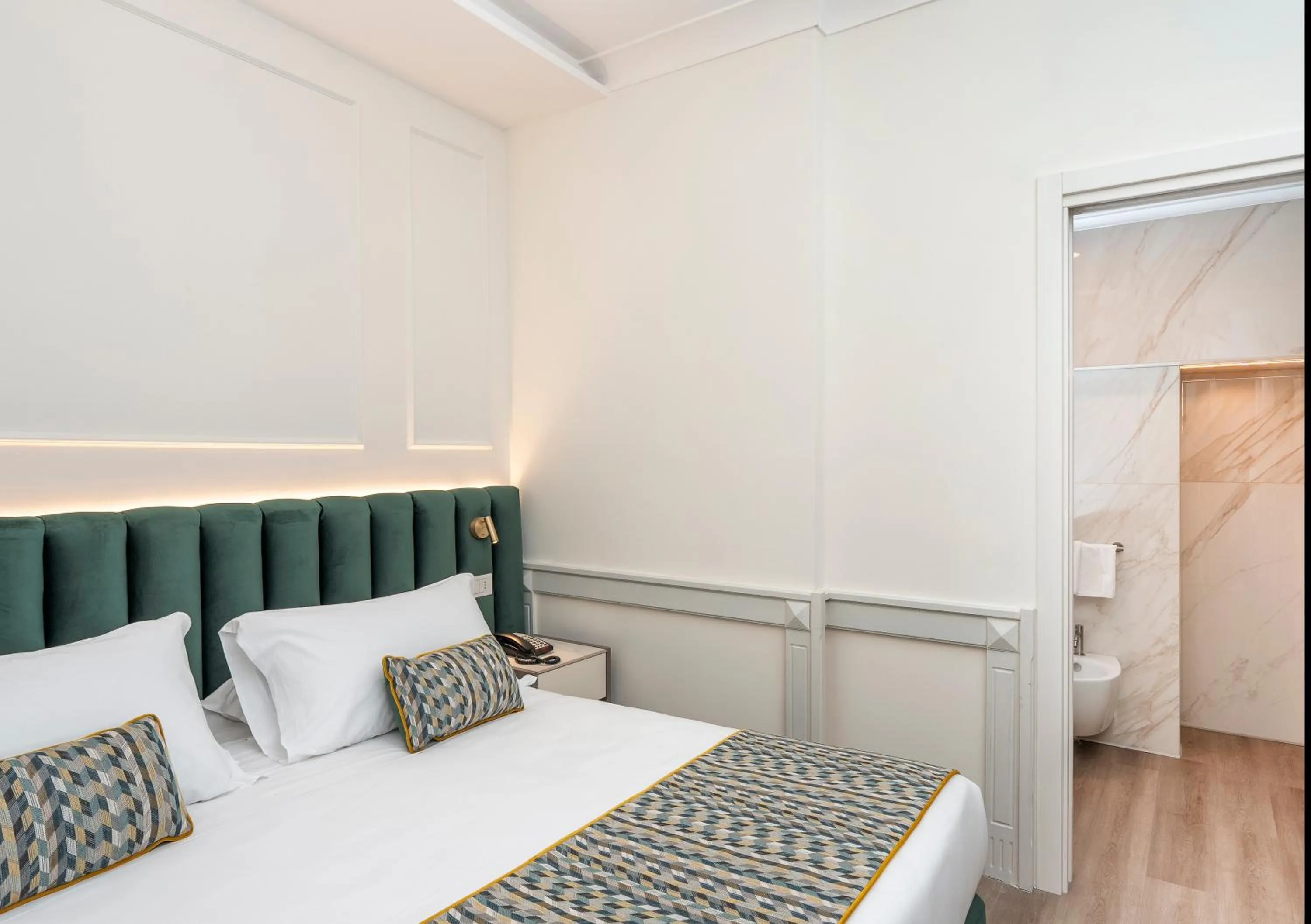 Bed in Hotel Michelangelo