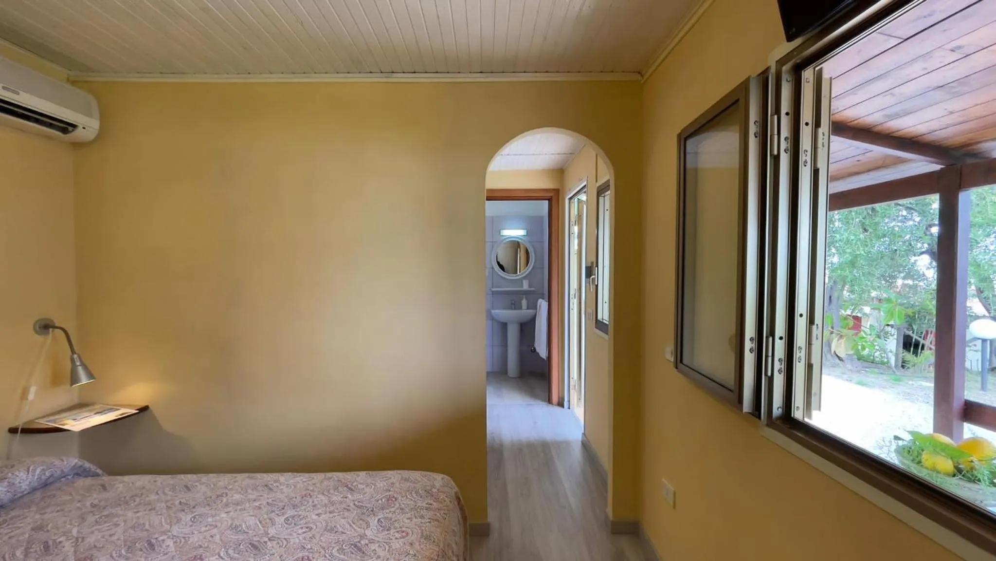 Photo of the whole room, Bed in Villaggio Villa Lubrense
