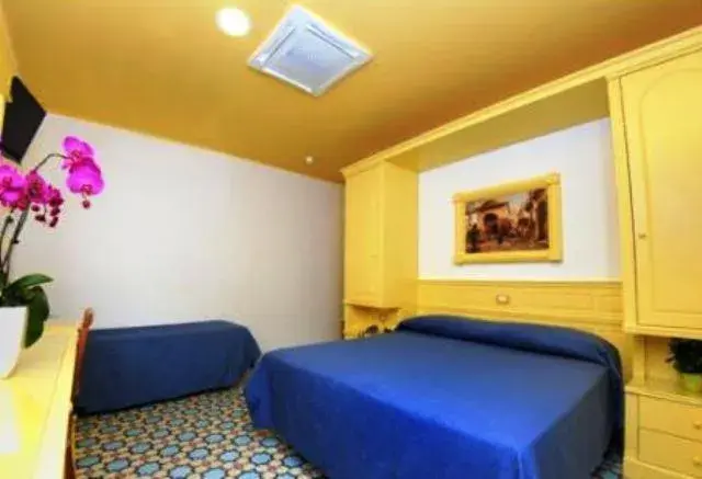 Bed in Hotel Astoria Sorrento Bed in Hotel Astoria Sorrento