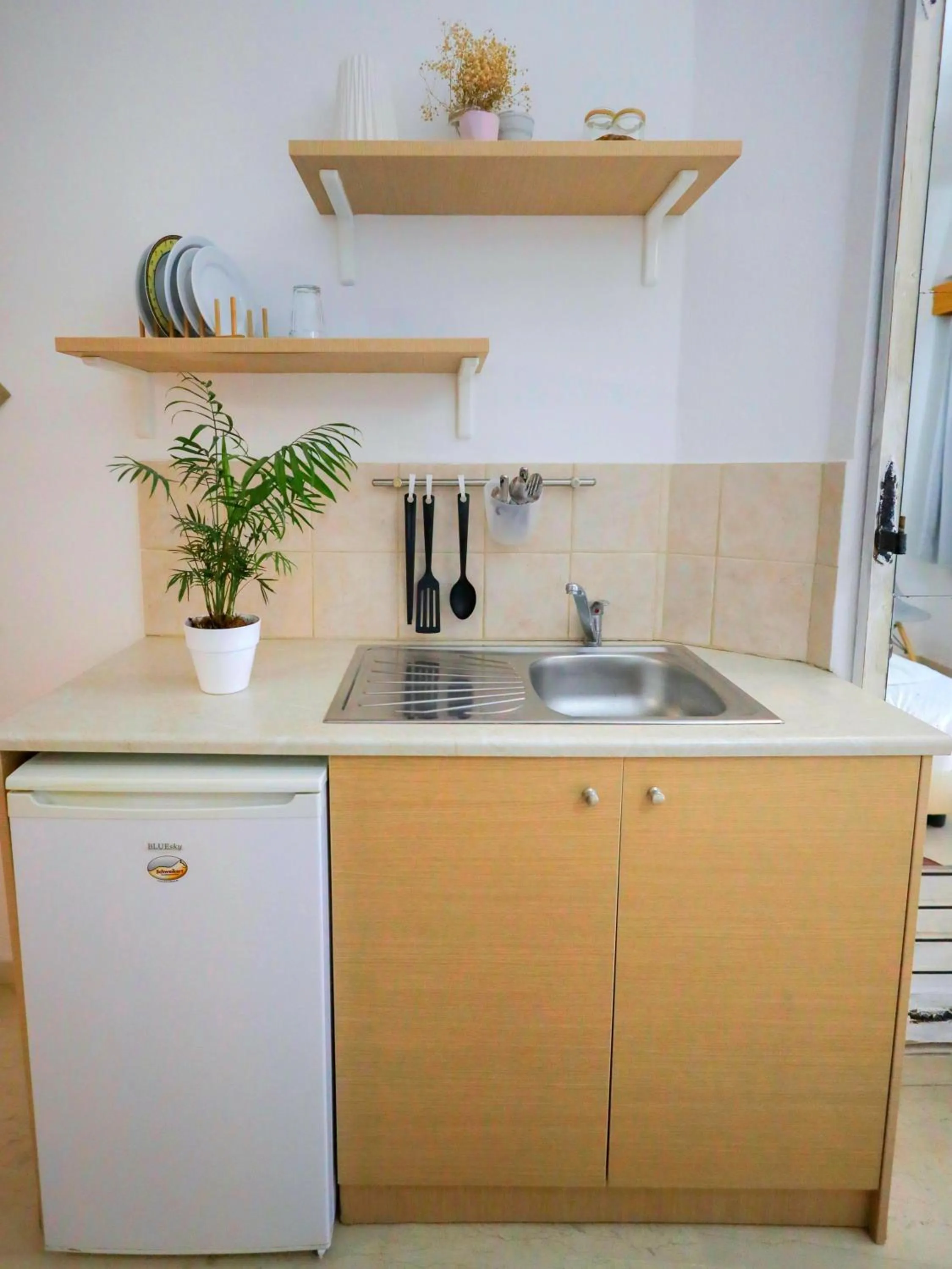 Kitchen or kitchenette in Malia Boutique Studios