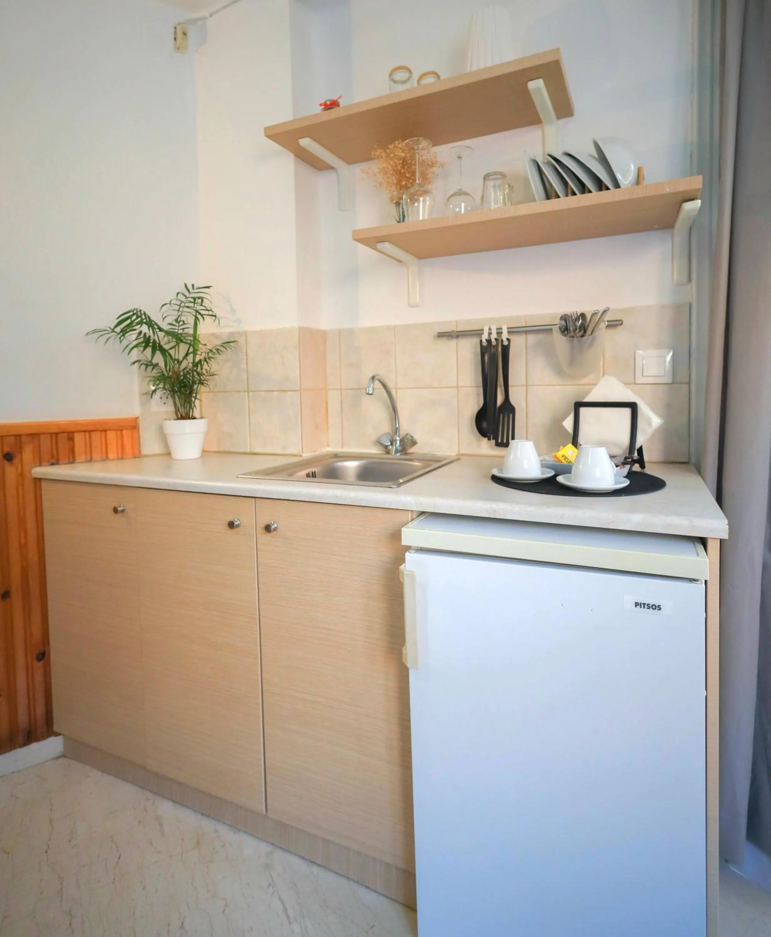 Kitchen or kitchenette in Malia Boutique Studios