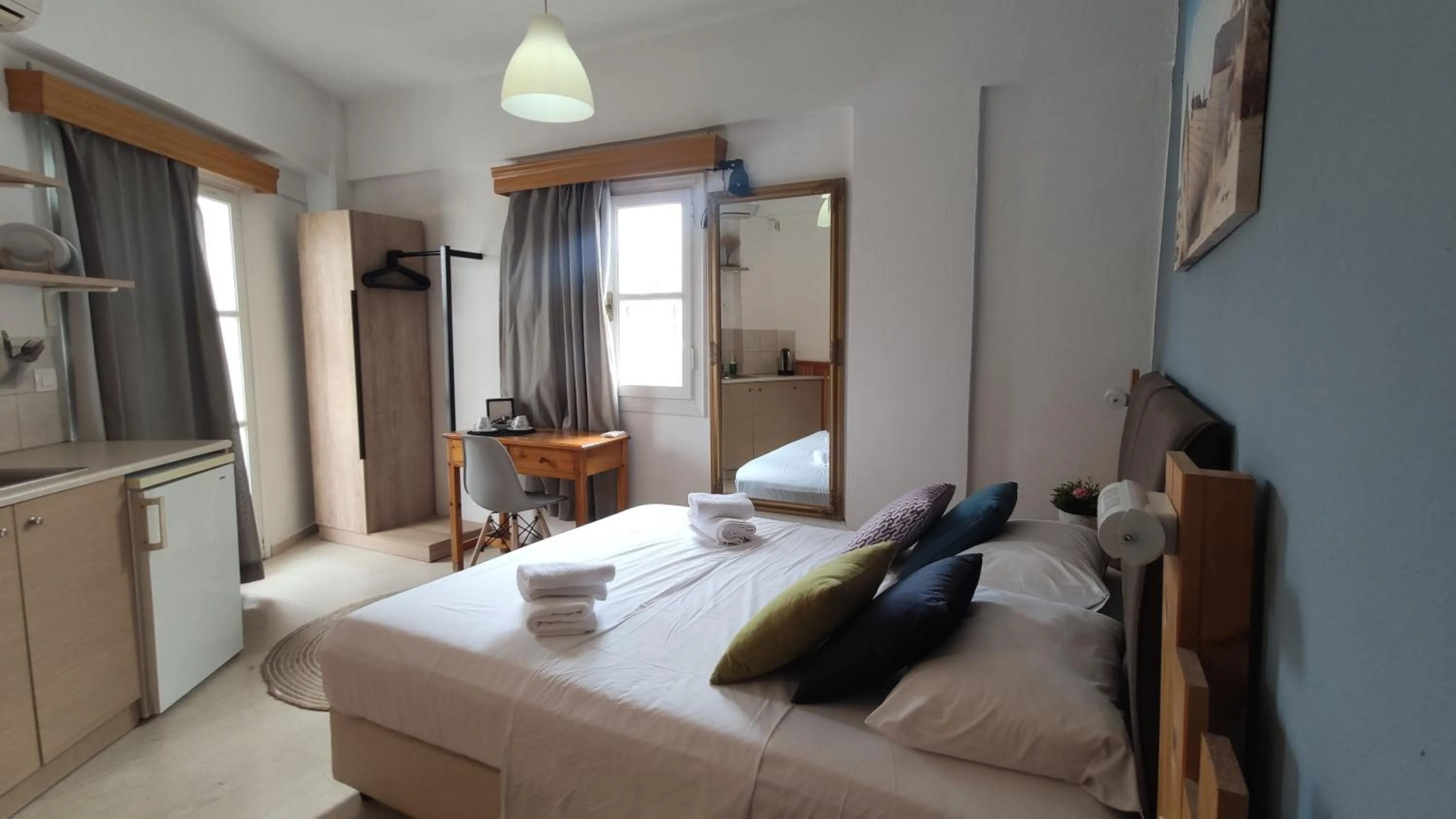 Photo of the whole room, Bed in Malia Boutique Studios