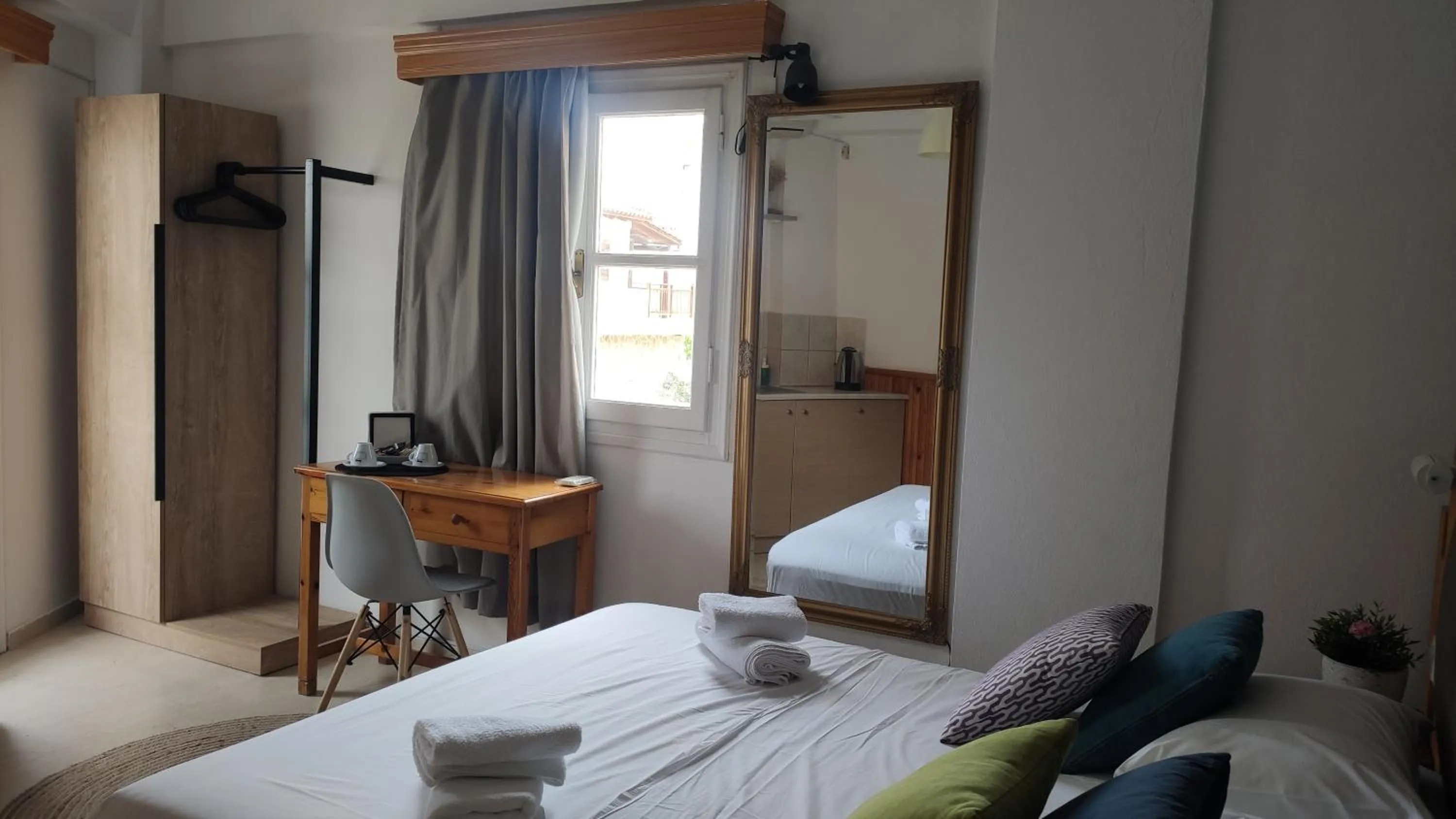 Photo of the whole room, Bed in Malia Boutique Studios