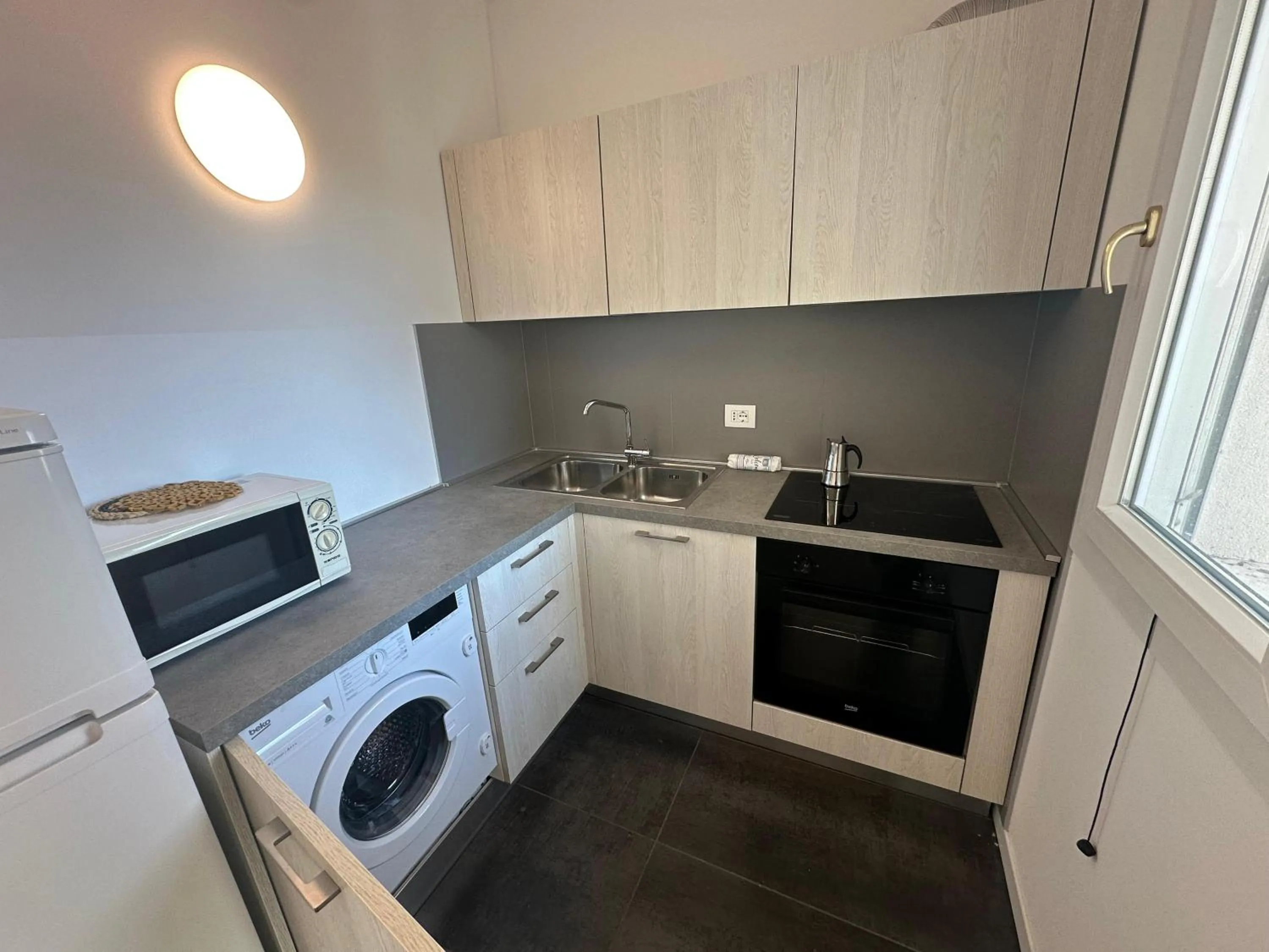 Kitchen or kitchenette in Residence Antares - Agenzia Cocal