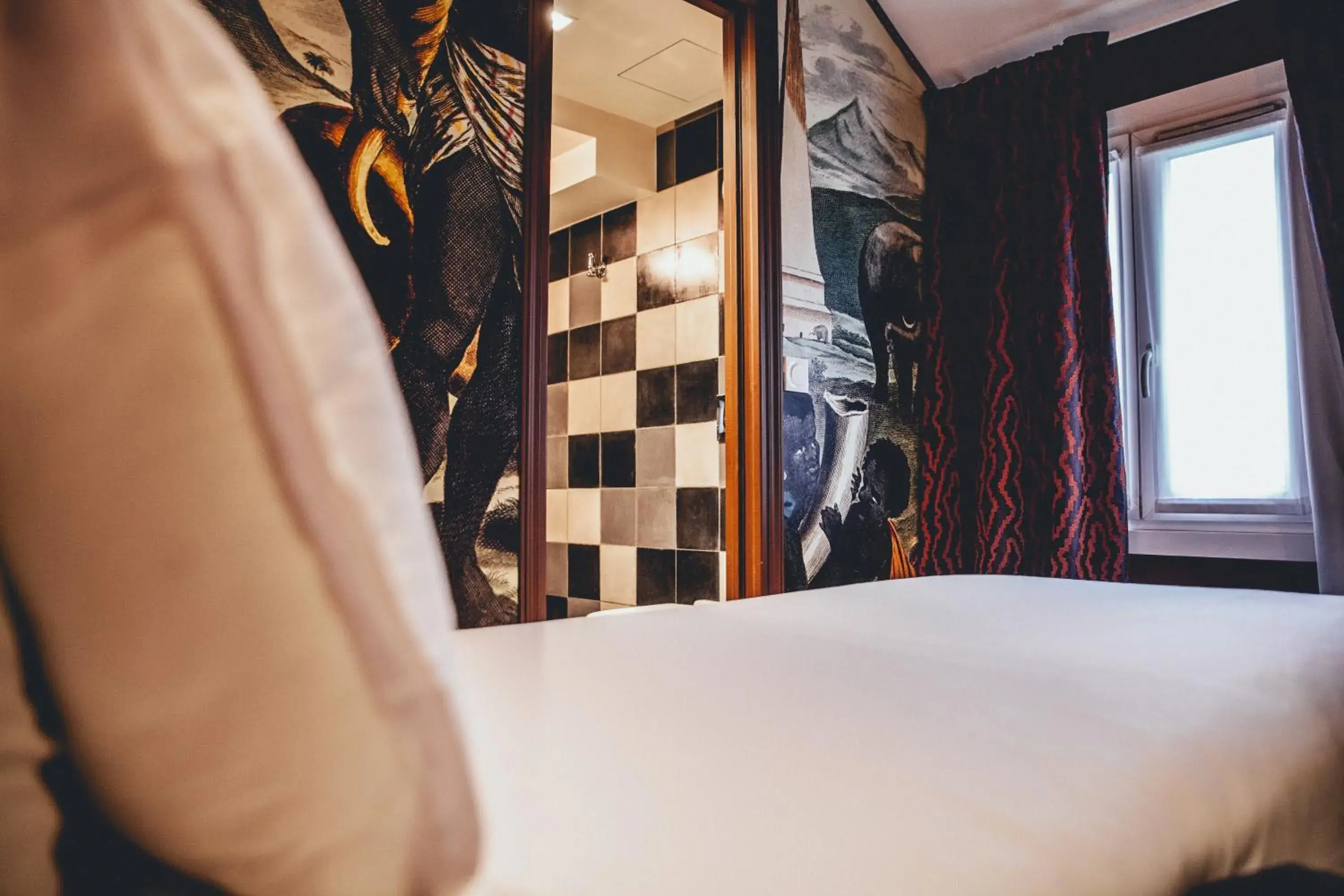 Photo of the whole room, Bed in Hôtel du Continent Photo of the whole room, Bed in Hôtel du Continent