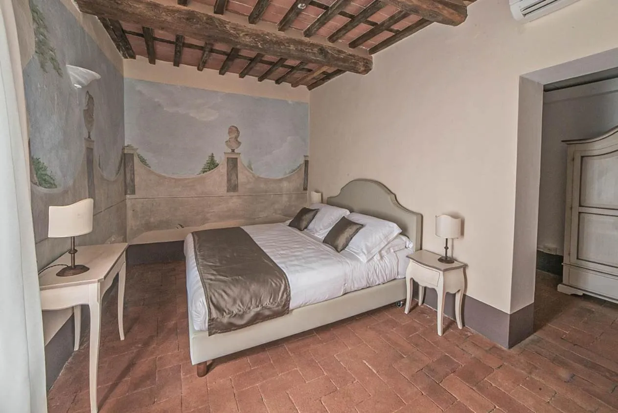 Bed in Relais Corte Rodeschi