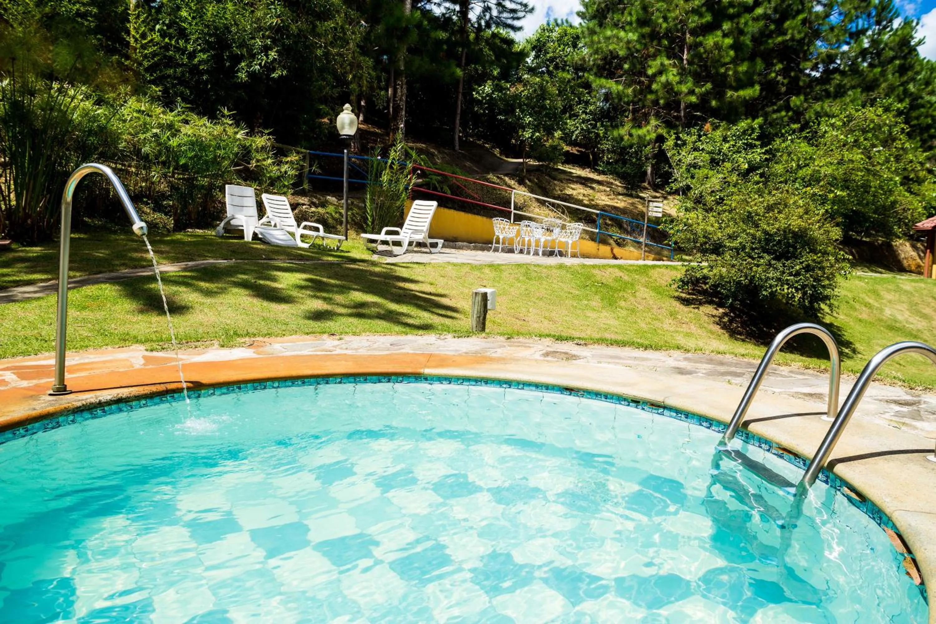 Swimming pool in Chez Domaine Pousada Organica