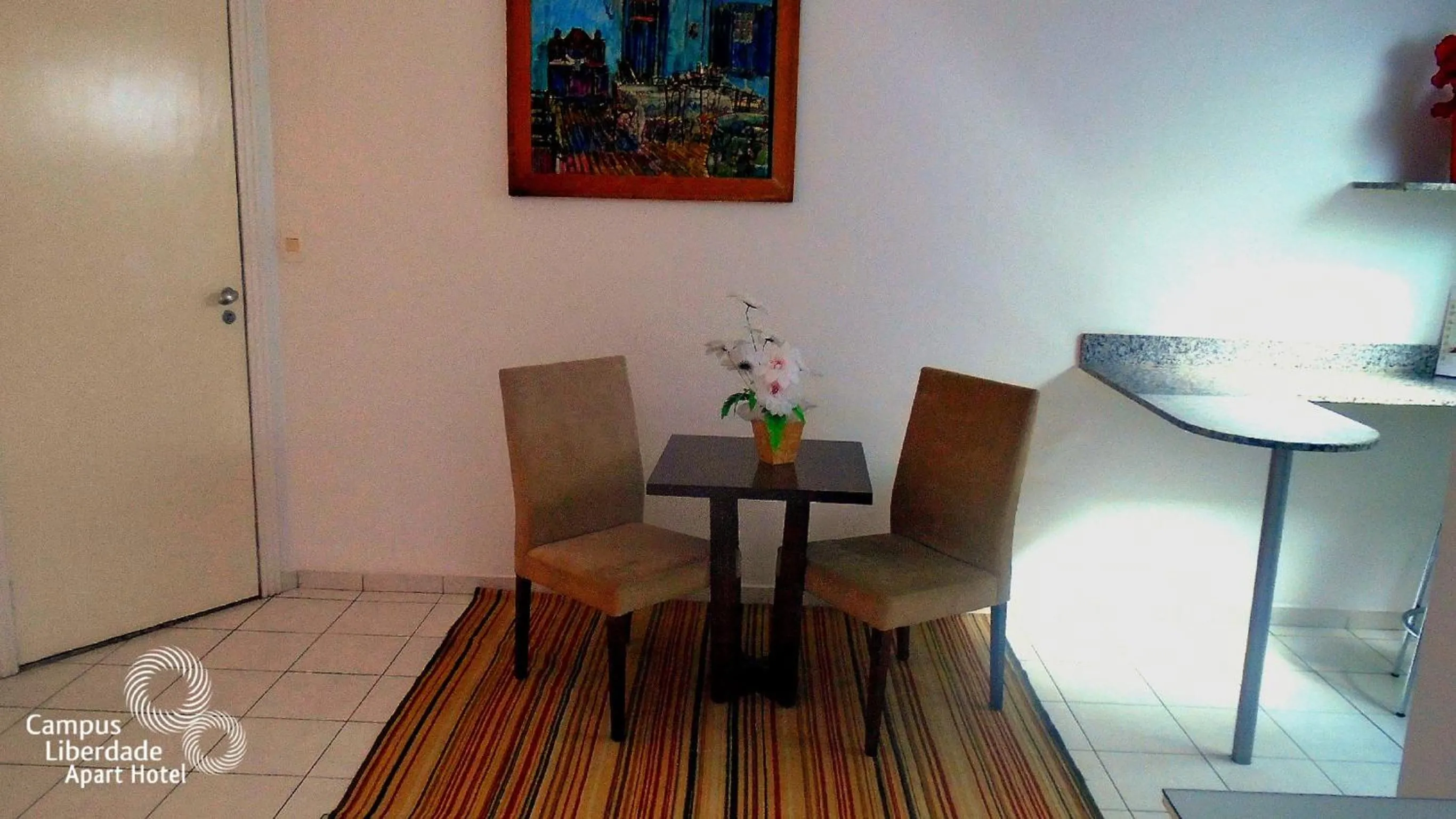 Seating area in Campus Liberdade Flat