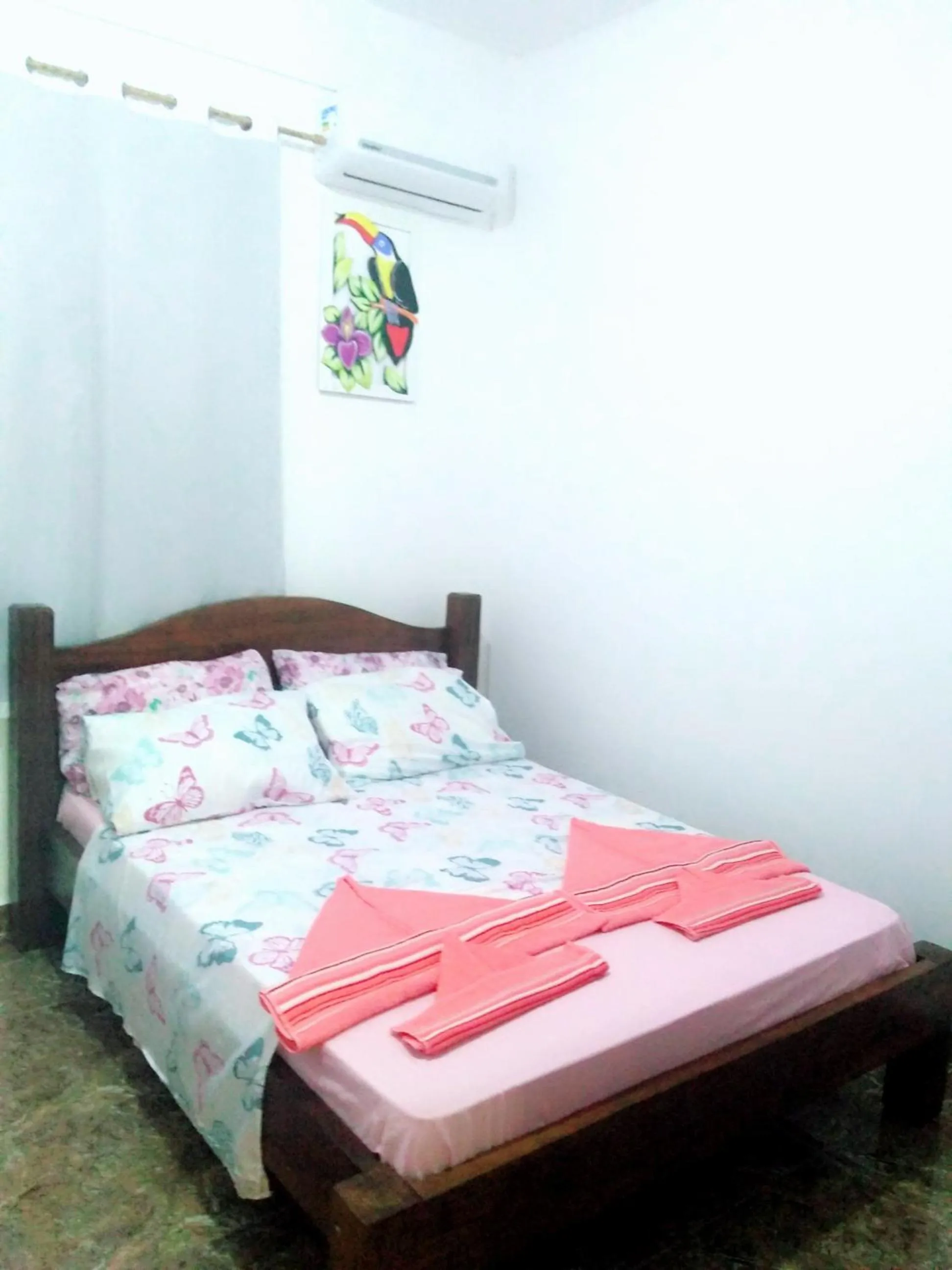 Bed in Francis Hotel Pousada