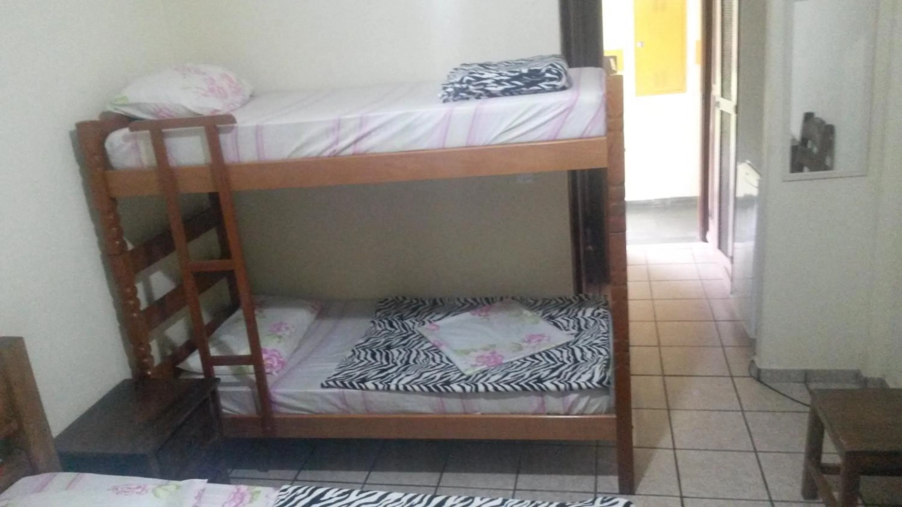 Bed in Francis Hotel Pousada