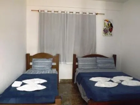 Bed in Francis Hotel Pousada