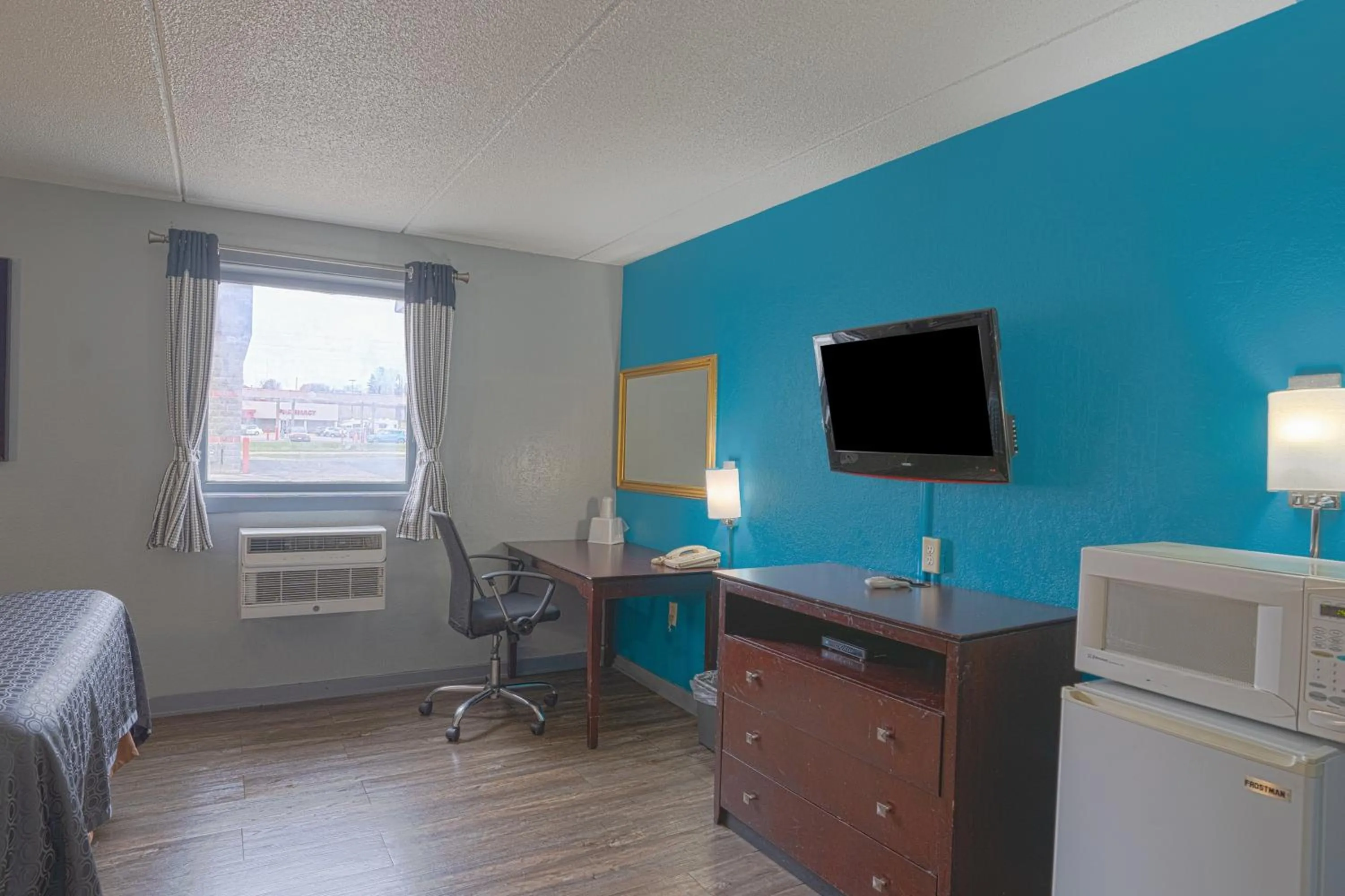Bedroom in Executive Inn Owatonna Hwy 35