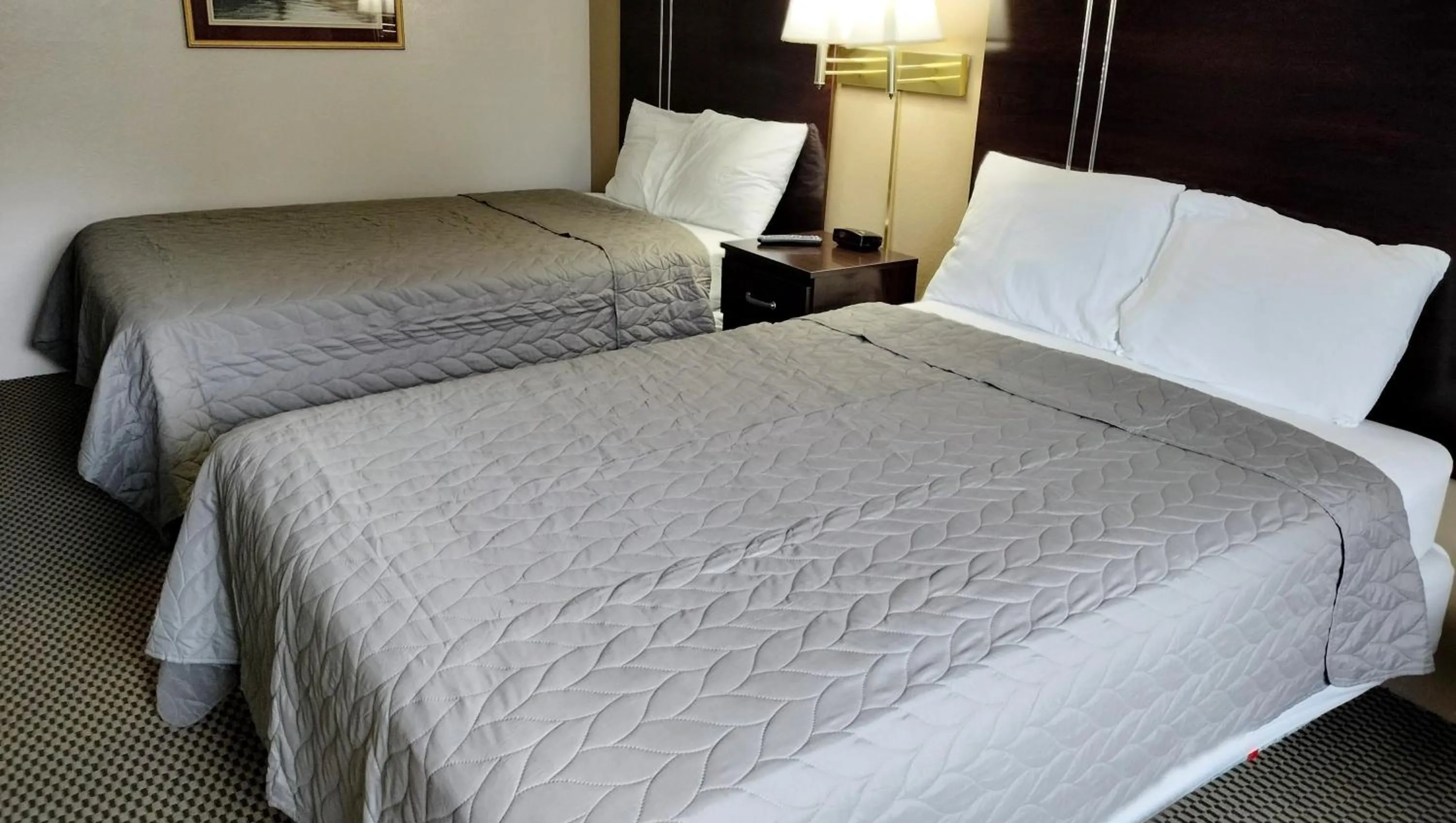 Bedroom, Bed in Magnuson Hotel Ironwood