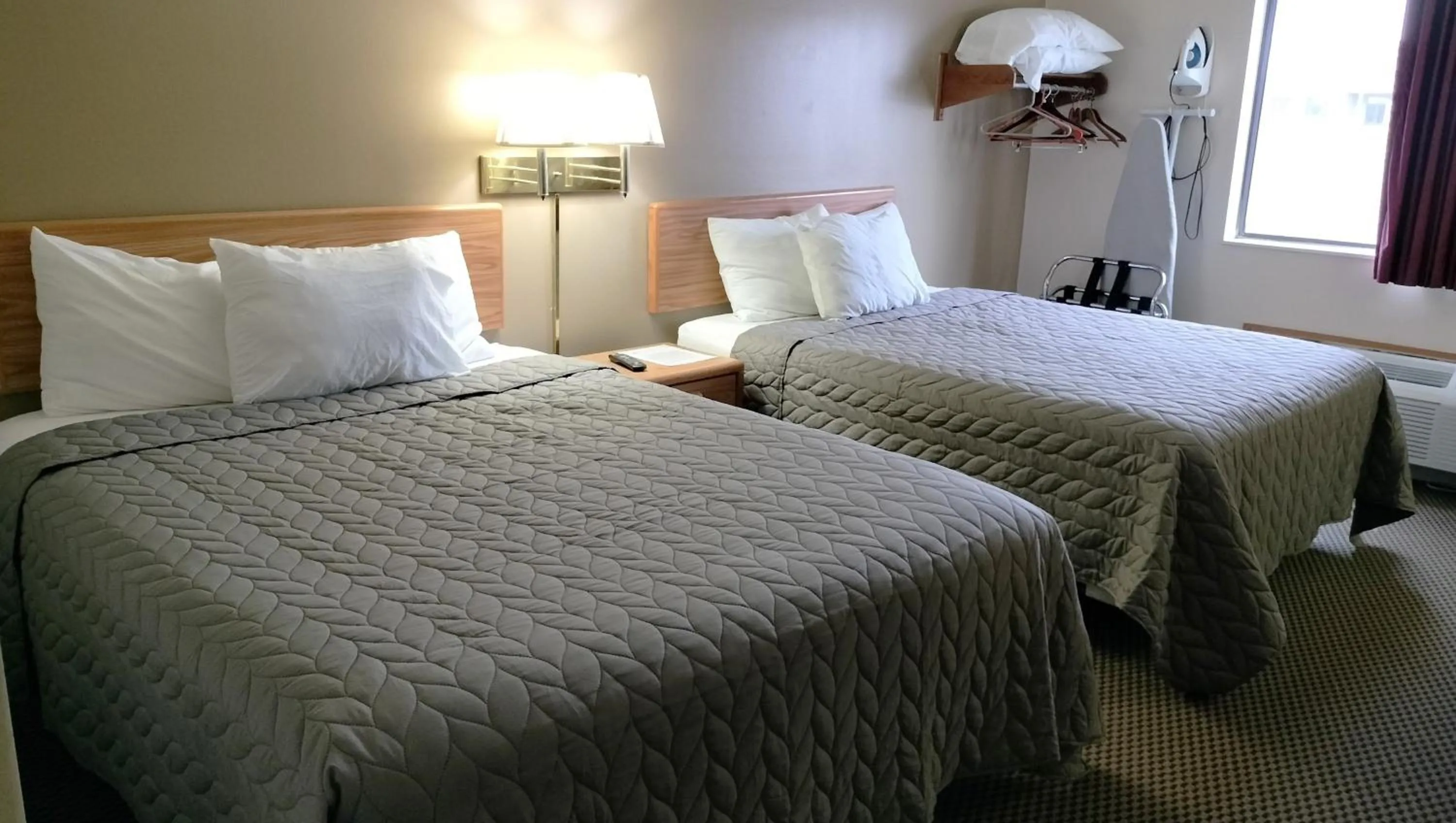 Bedroom, Bed in Magnuson Hotel Ironwood