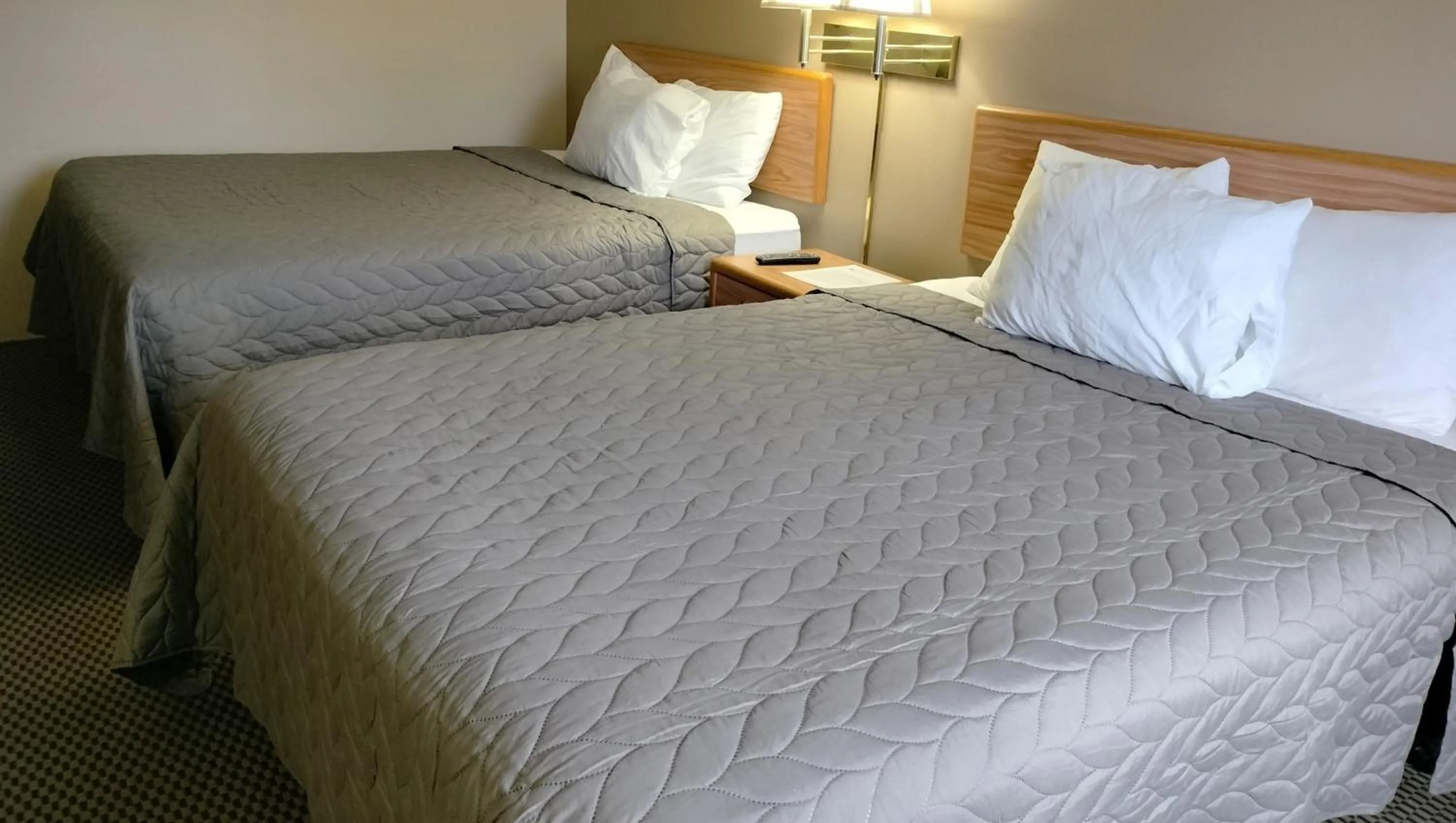 Bedroom, Bed in Magnuson Hotel Ironwood