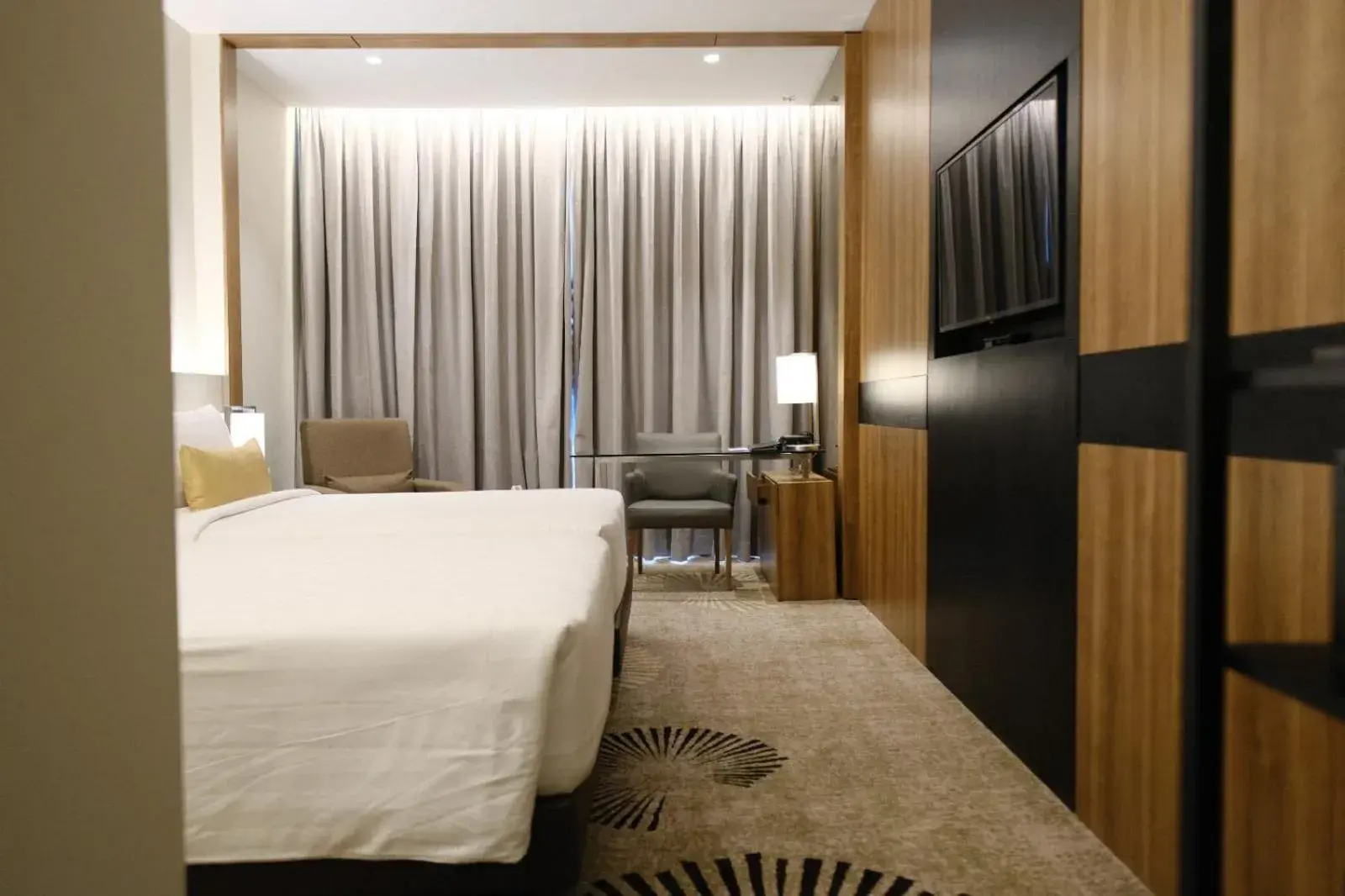 Property building, Bed in The Premiere Hotel Pekanbaru Property building, Bed in The Premiere Hotel Pekanbaru