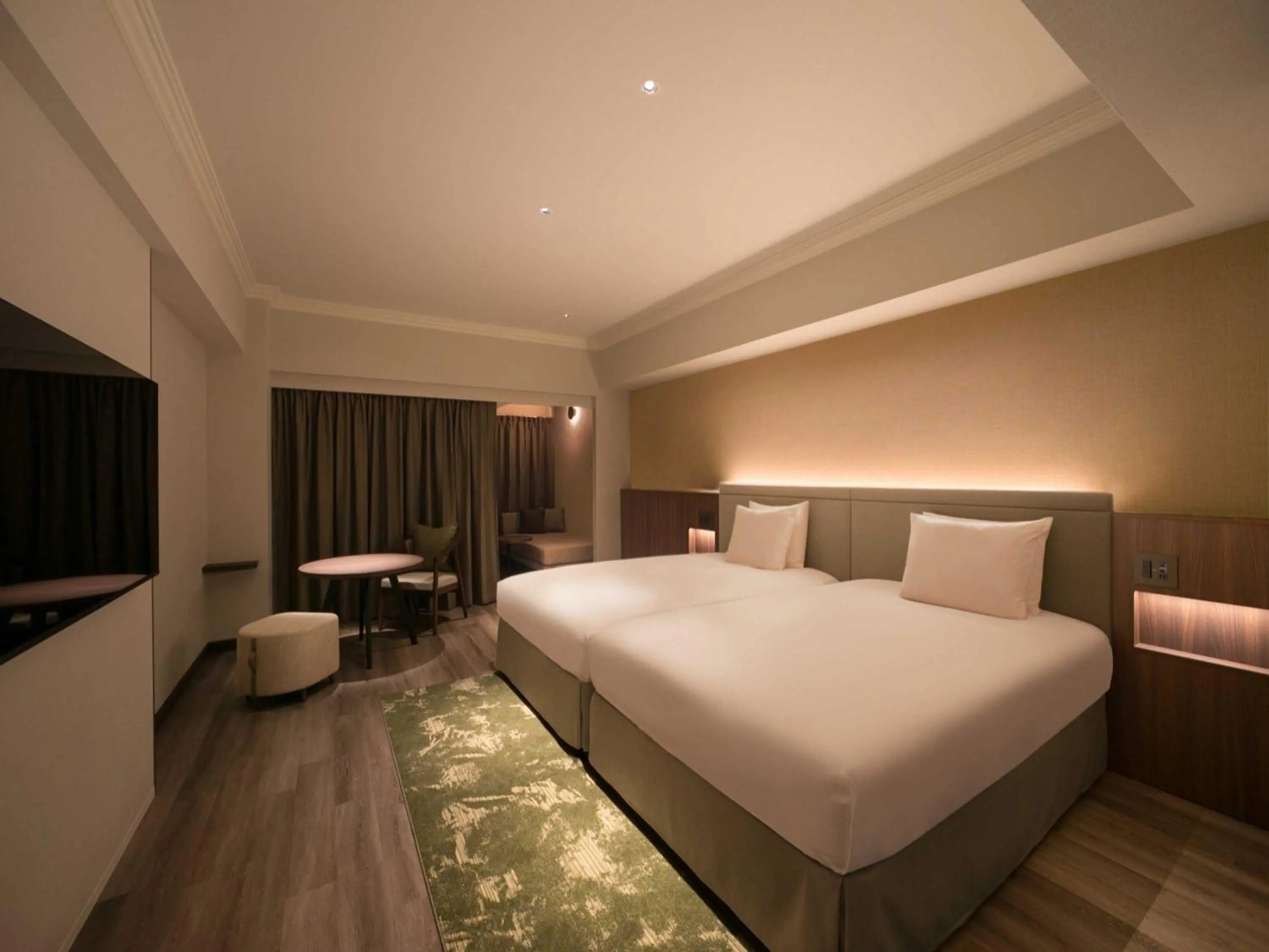 Bed in Oriental Hotel Okinawa Resort & Spa