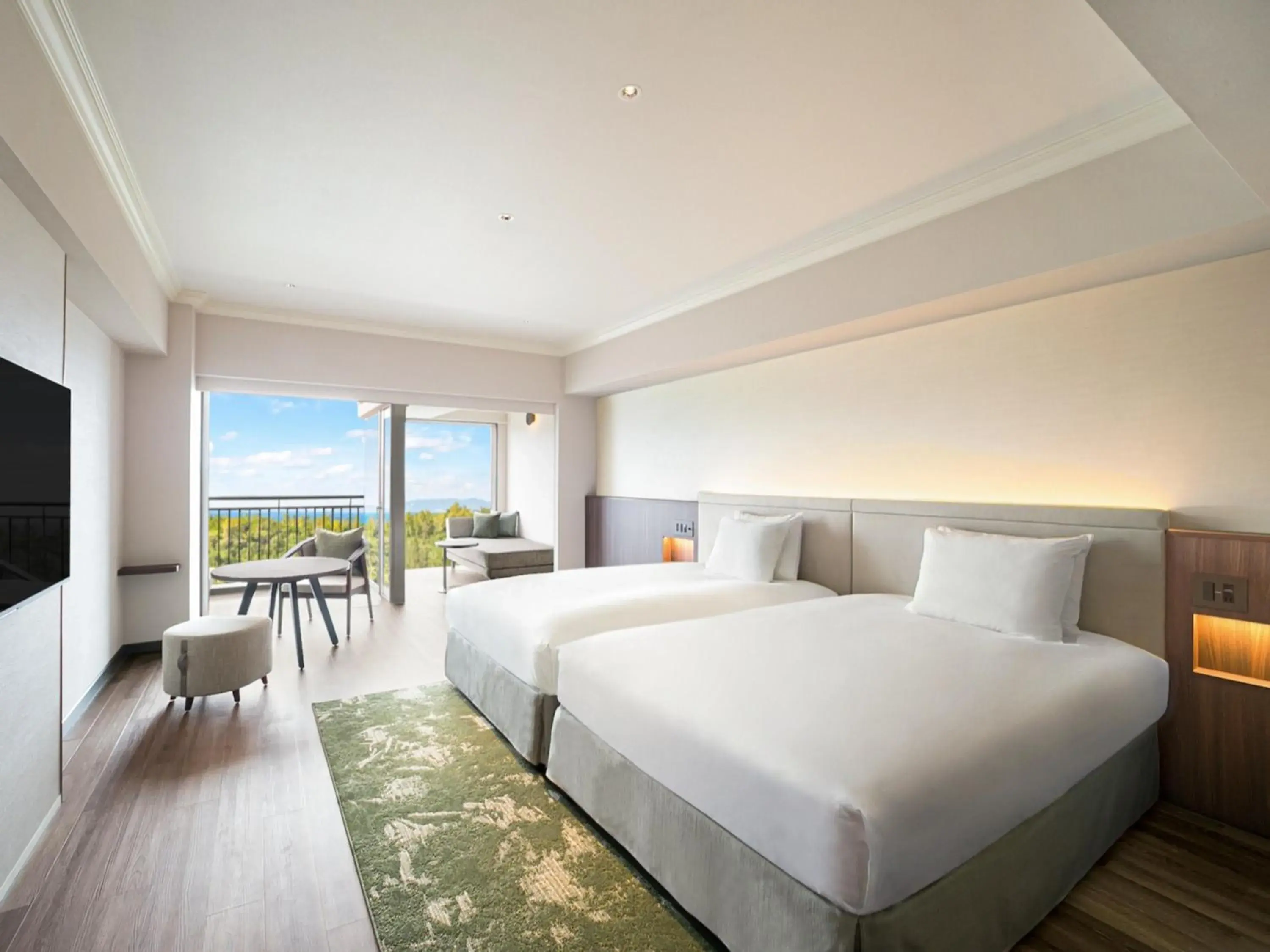 Bed in Oriental Hotel Okinawa Resort & Spa Bed in Oriental Hotel Okinawa Resort & Spa