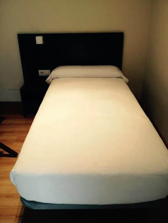 Bed in Aparthotel Jardines de Aristi