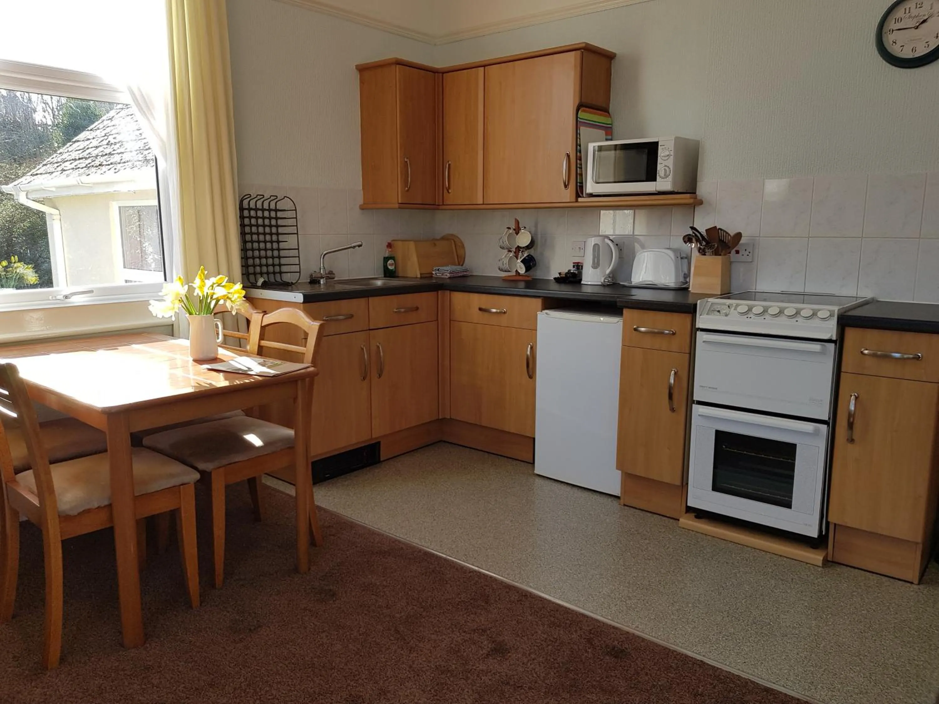 Kitchen or kitchenette in Abbey View Holiday Flats