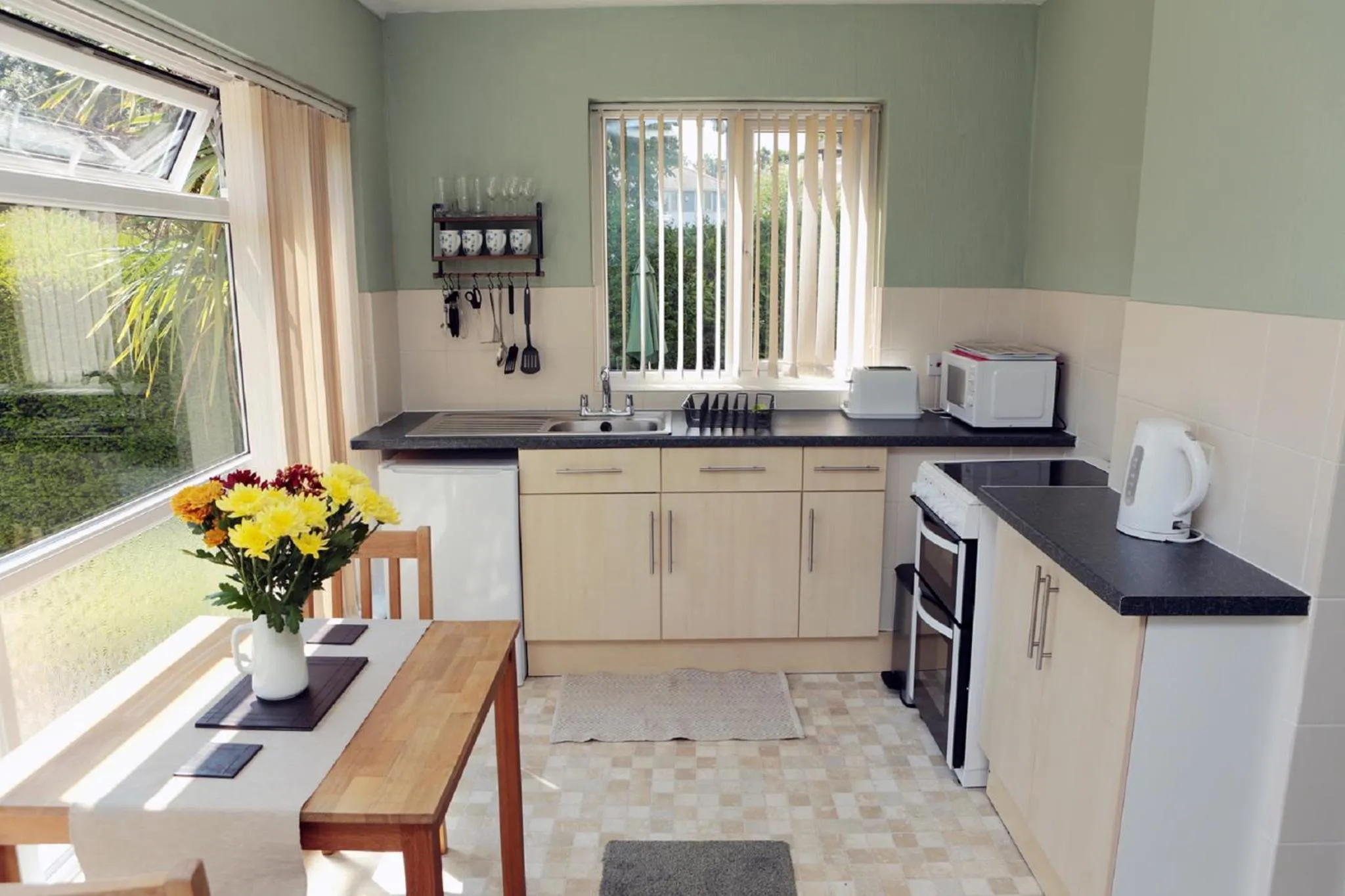 Kitchen or kitchenette in Abbey View Holiday Flats