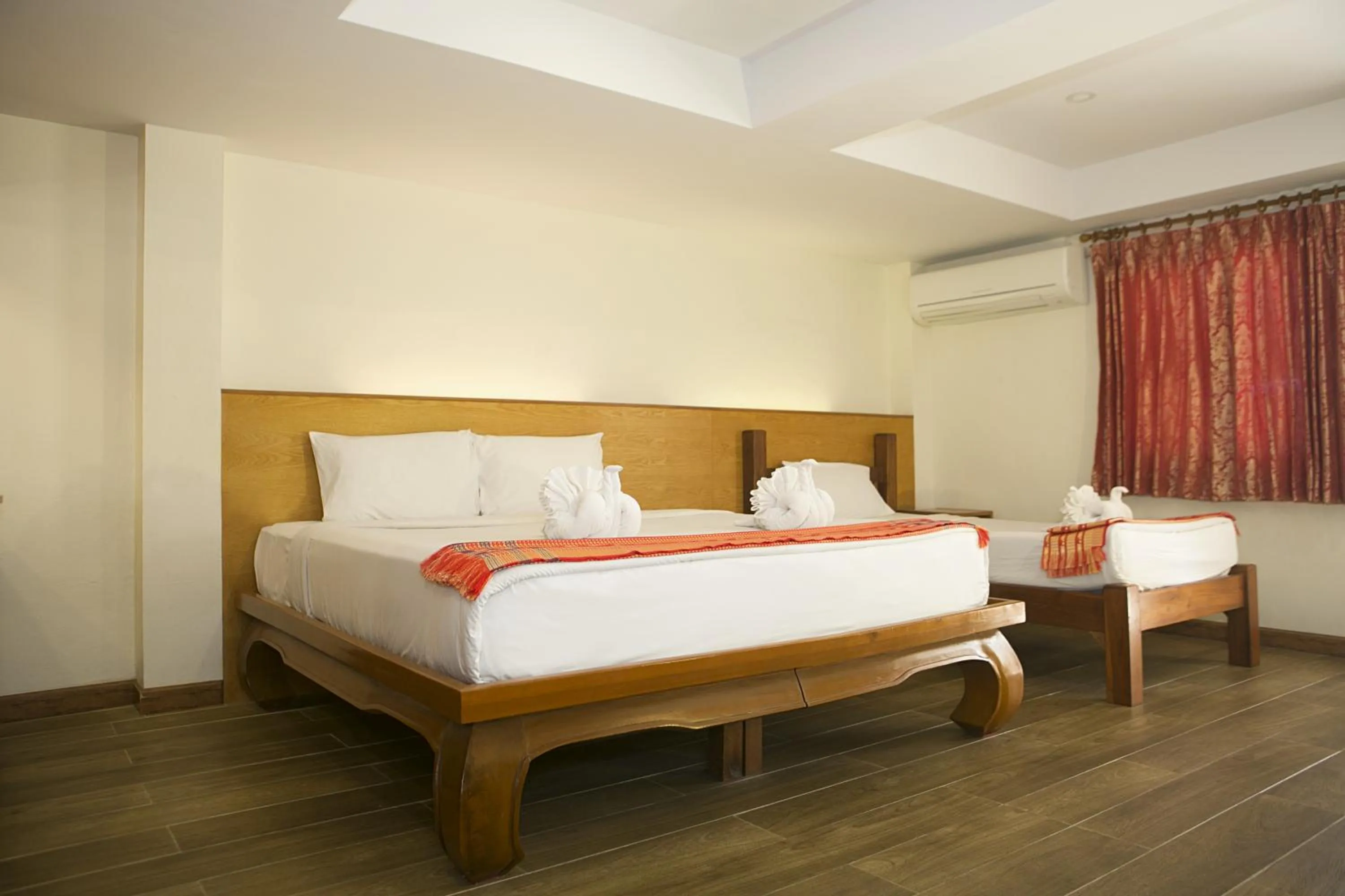 Bed in Patong Palace Hotel - SHA Extra Plus