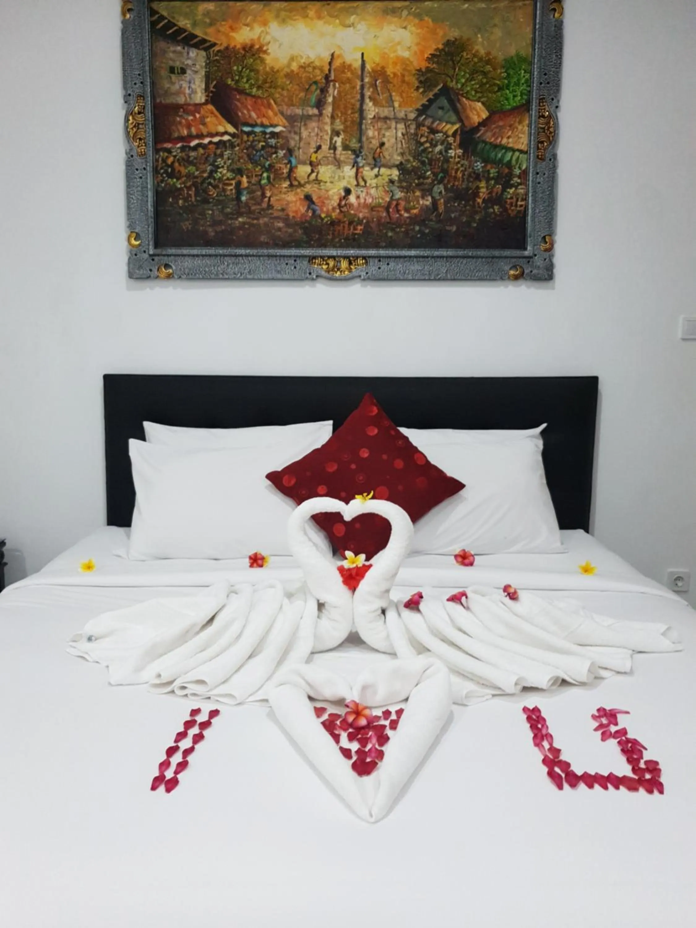 Bed in Palm Bamboo Hotel