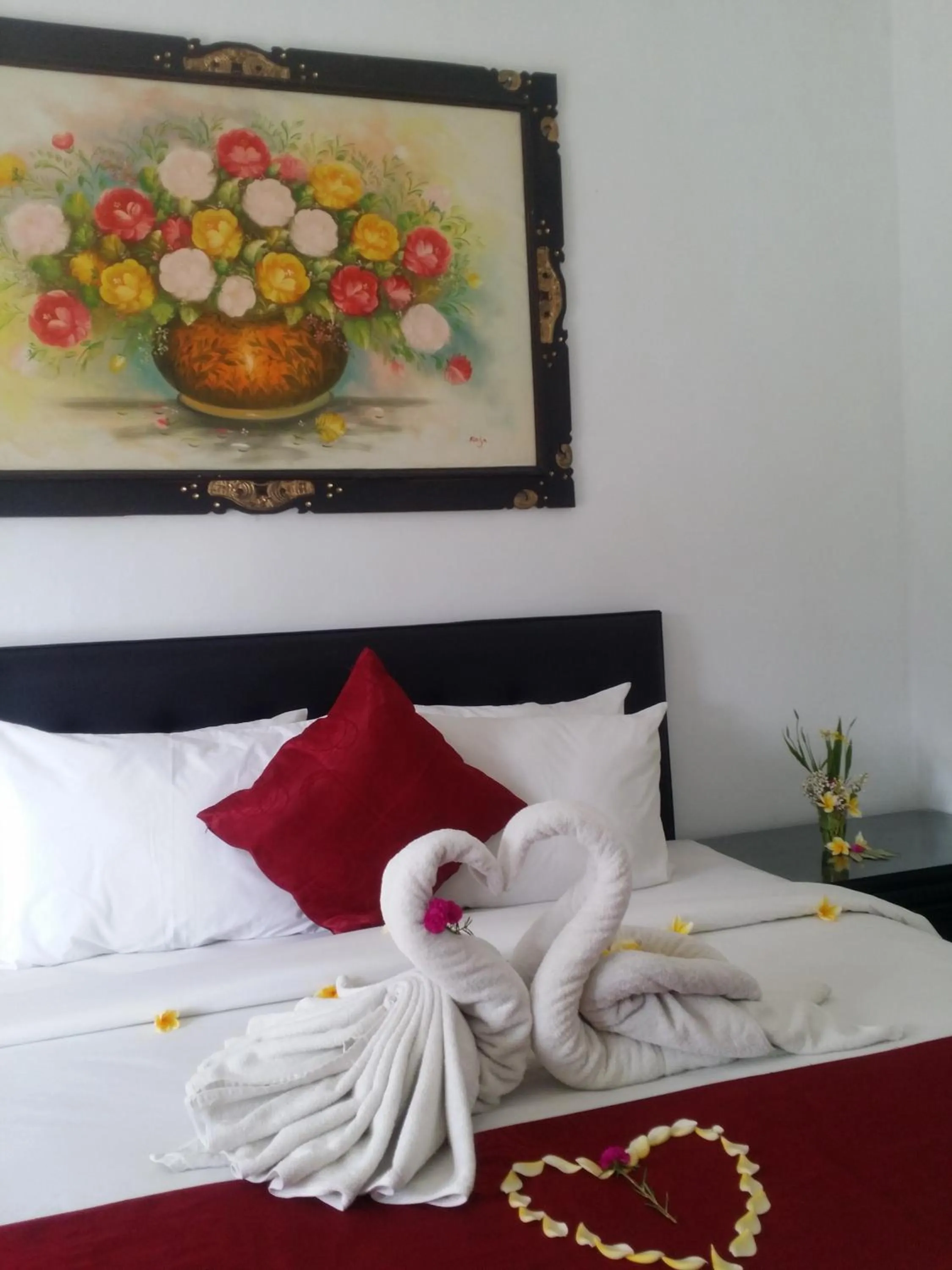 Bed in Palm Bamboo Hotel