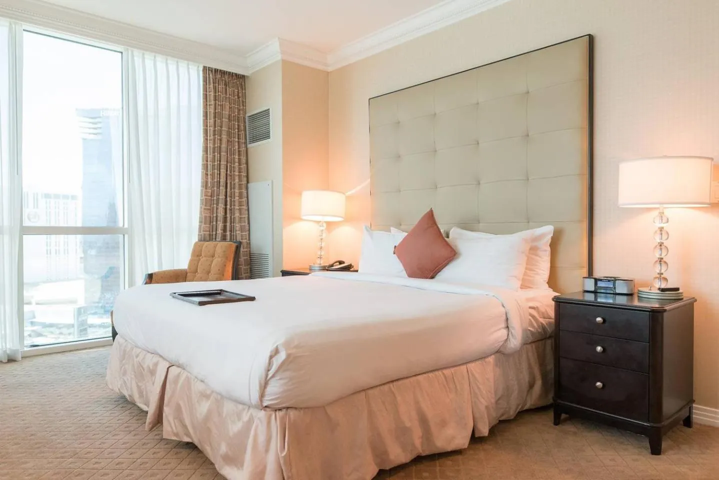 Bed in True 1BR Balcony Suite with Strip View at MGM Signature