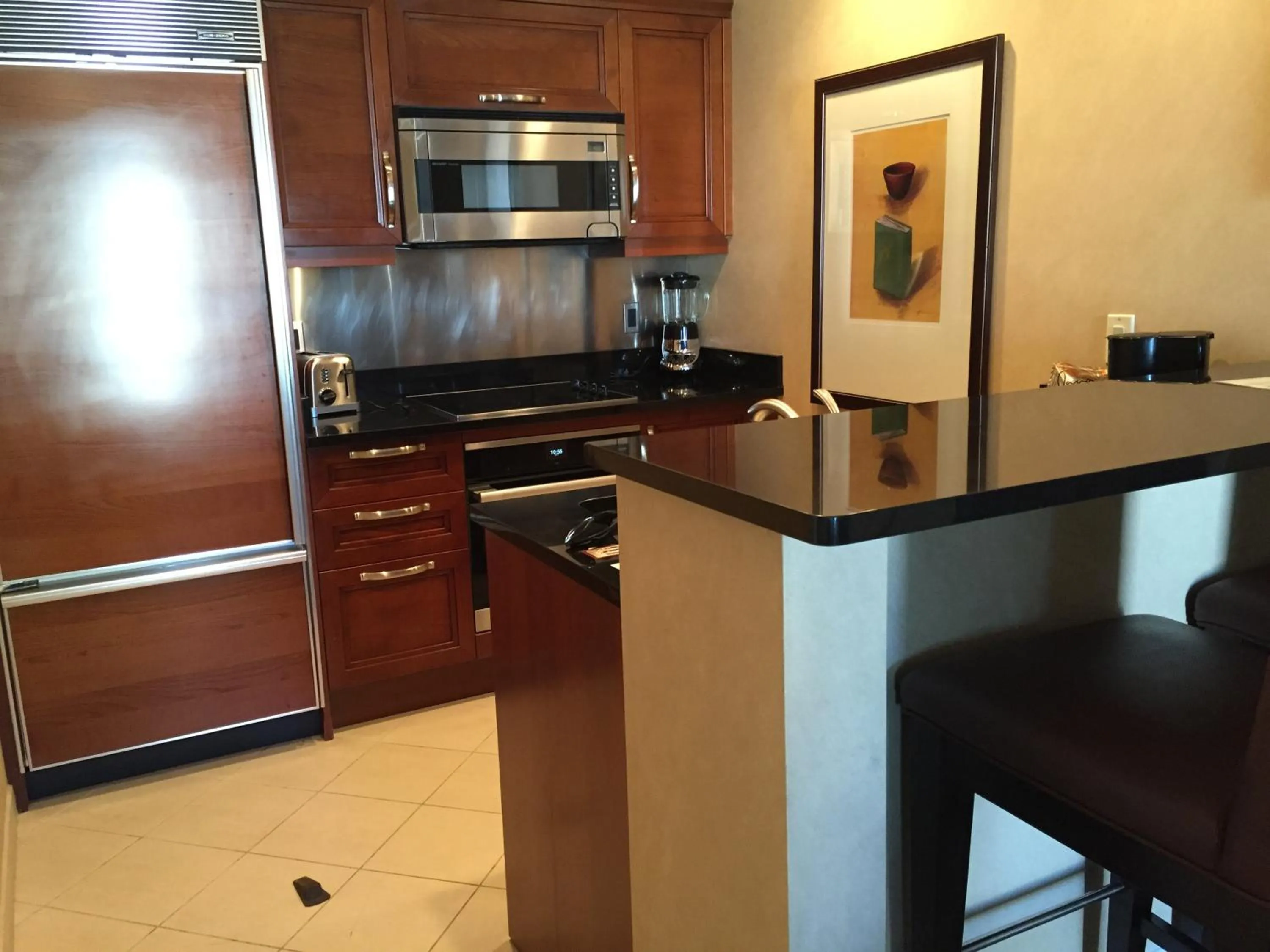 Kitchen or kitchenette in True 1BR Balcony Suite with Strip View at MGM Signature