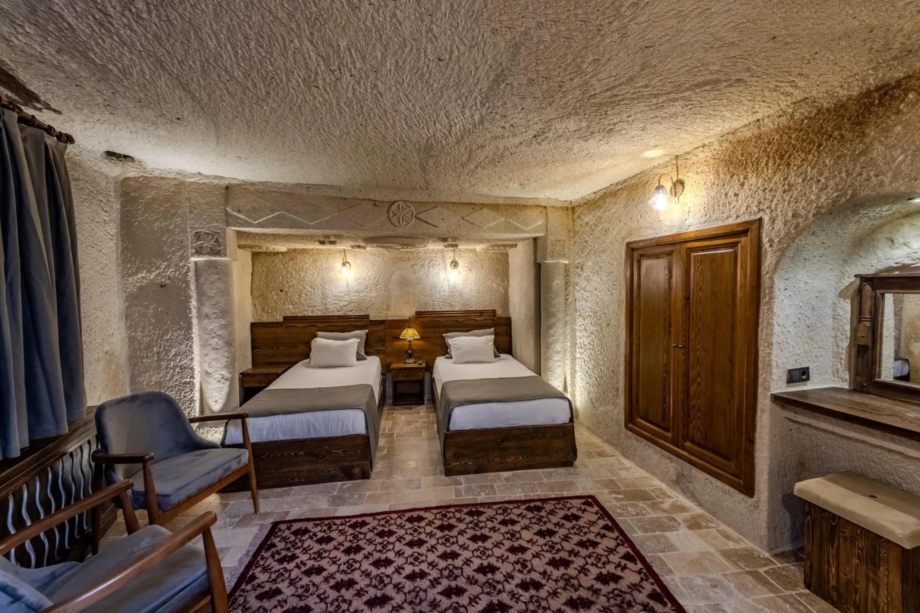 Bed in Castle Cave Hotel