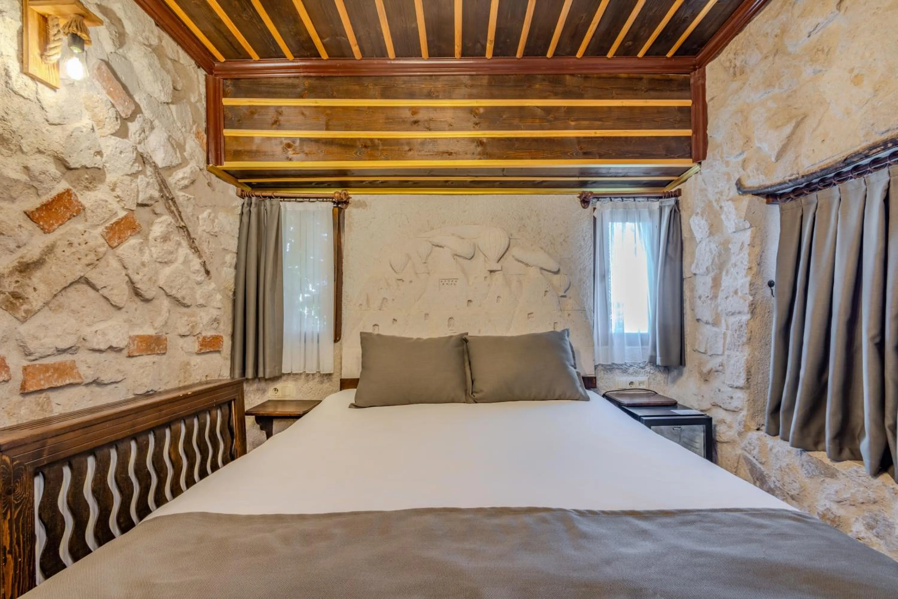 Bed in Castle Cave Hotel