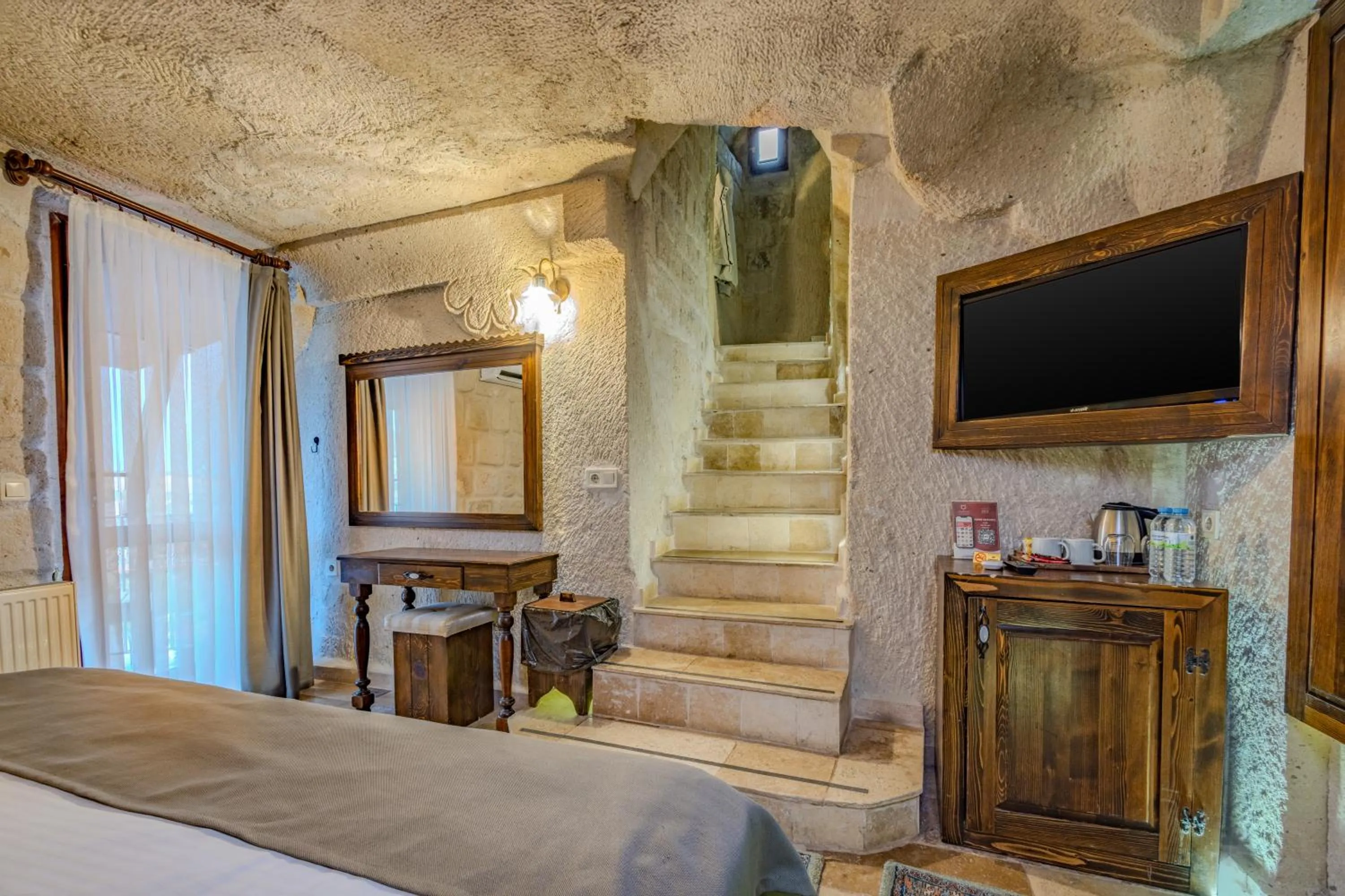 Bed in Castle Cave Hotel