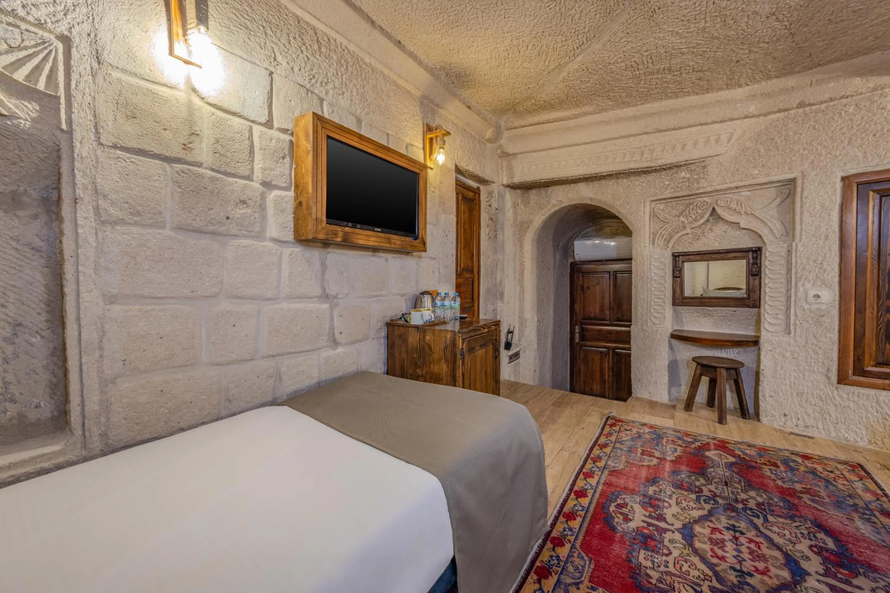 Bed in Castle Cave Hotel