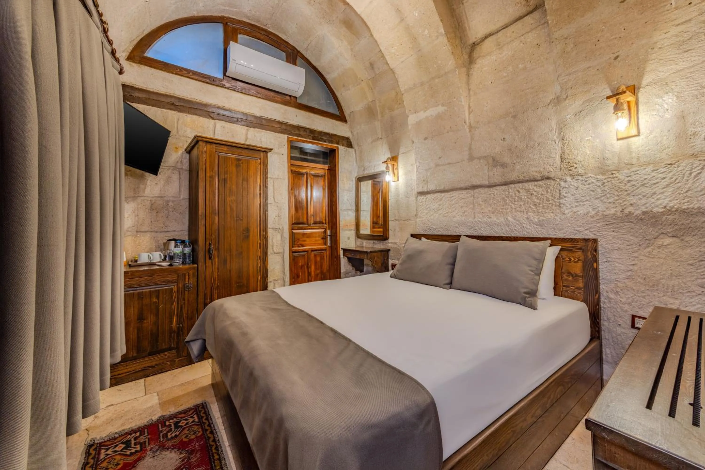 Bed in Castle Cave Hotel