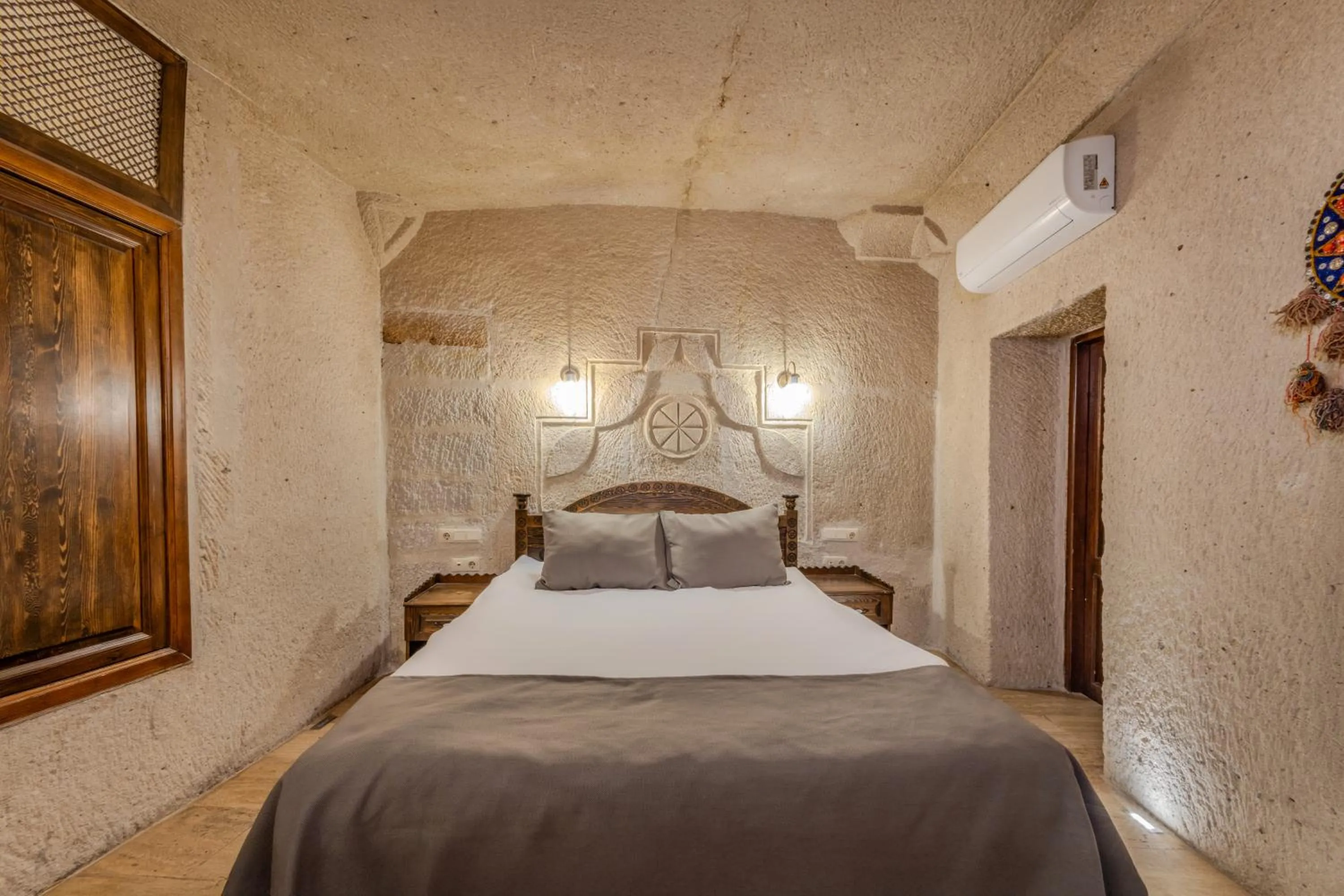 Bed in Castle Cave Hotel