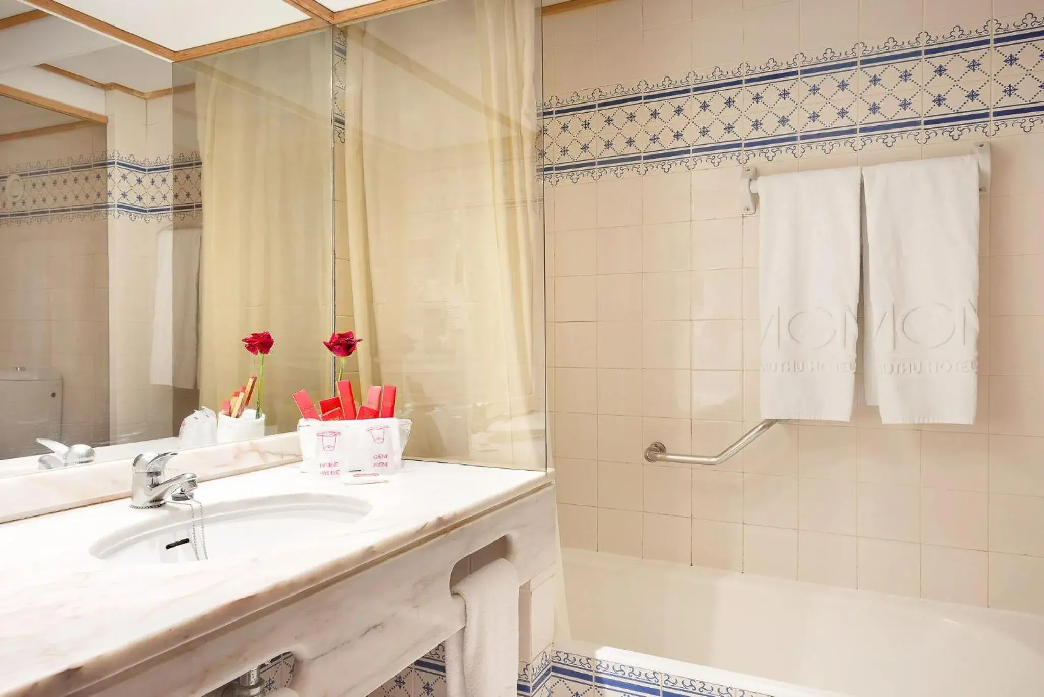 Bathroom in Muthu Oura Praia Hotel Bathroom in Muthu Oura Praia Hotel