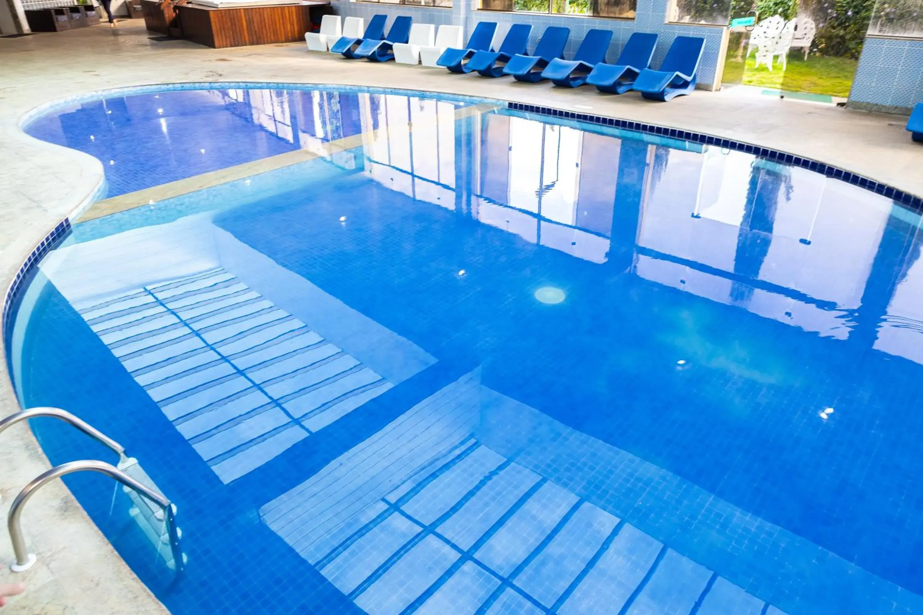 Swimming pool in Hotel Golden Park All Inclusive Poços de Caldas By Nacional Inn Swimming pool in Hotel Golden Park All Inclusive Poços de Caldas By Nacional Inn