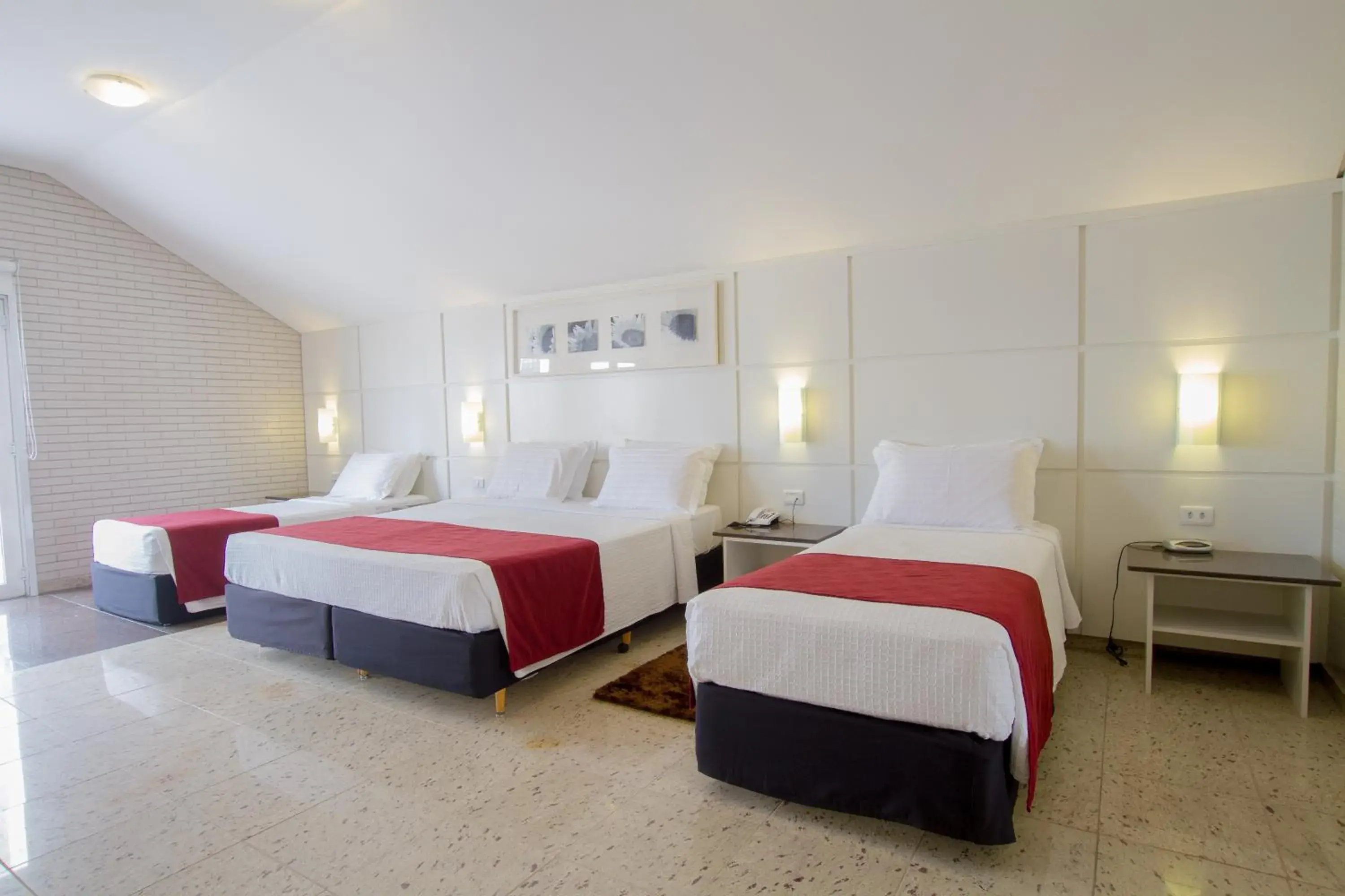 Standard Quadruple Room in Hotel Confiance Prime Batel Standard Quadruple Room in Hotel Confiance Prime Batel
